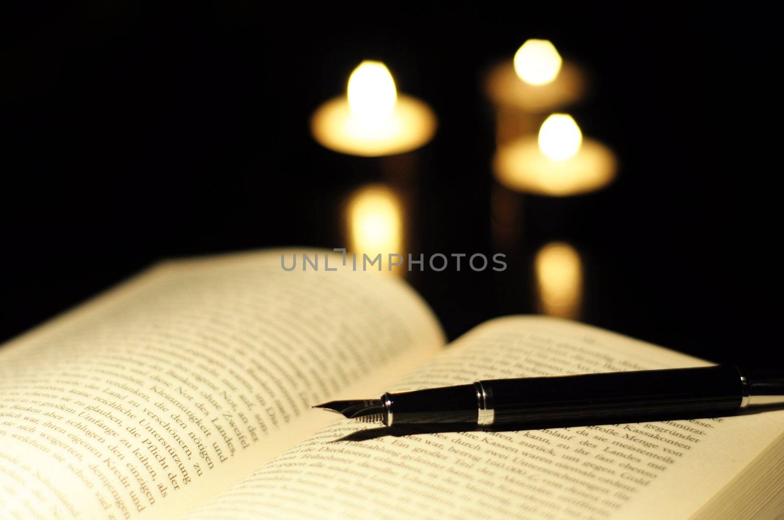 book candle and glasses with black copyspace