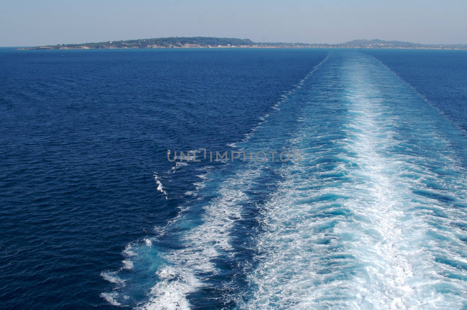 Leaving land and a trail from the cruise ship.