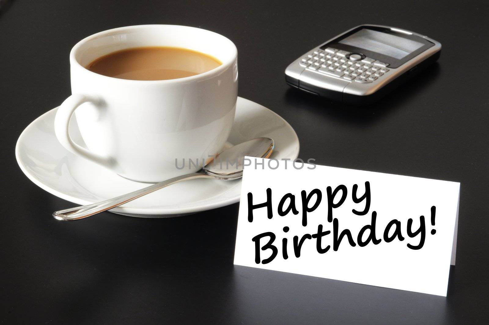 happy birthday greeting card with cup of coffee on black