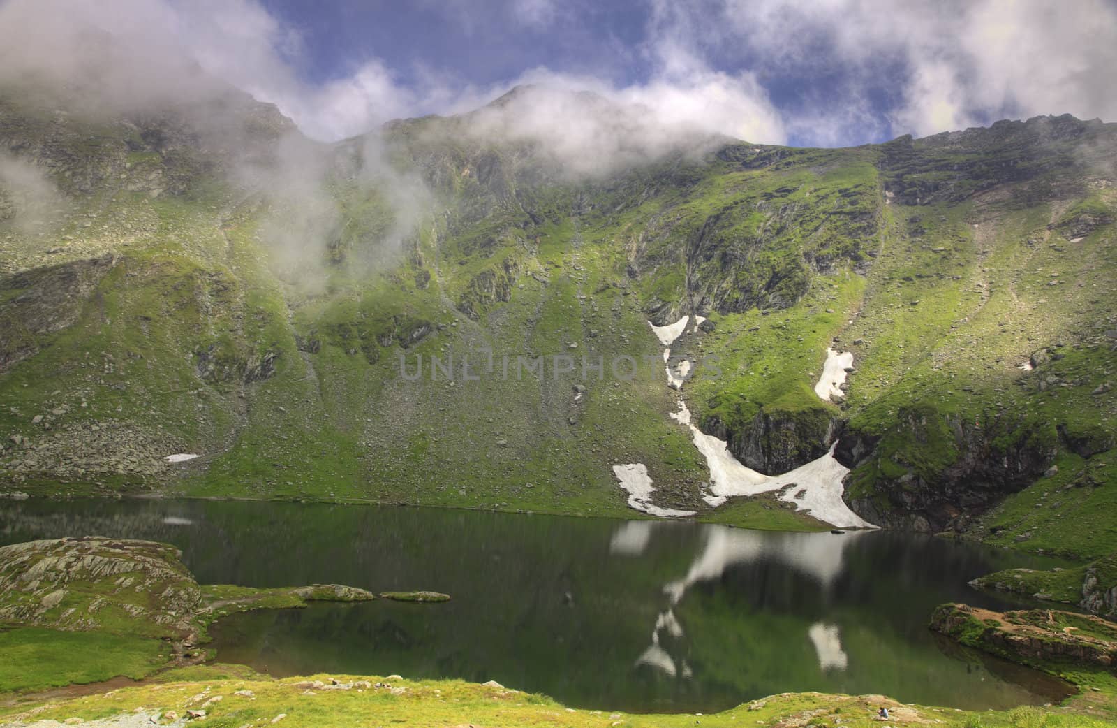 Mountainous landscape with a lake.Location:Balea Lake from Fagaras Mountains,Romania.