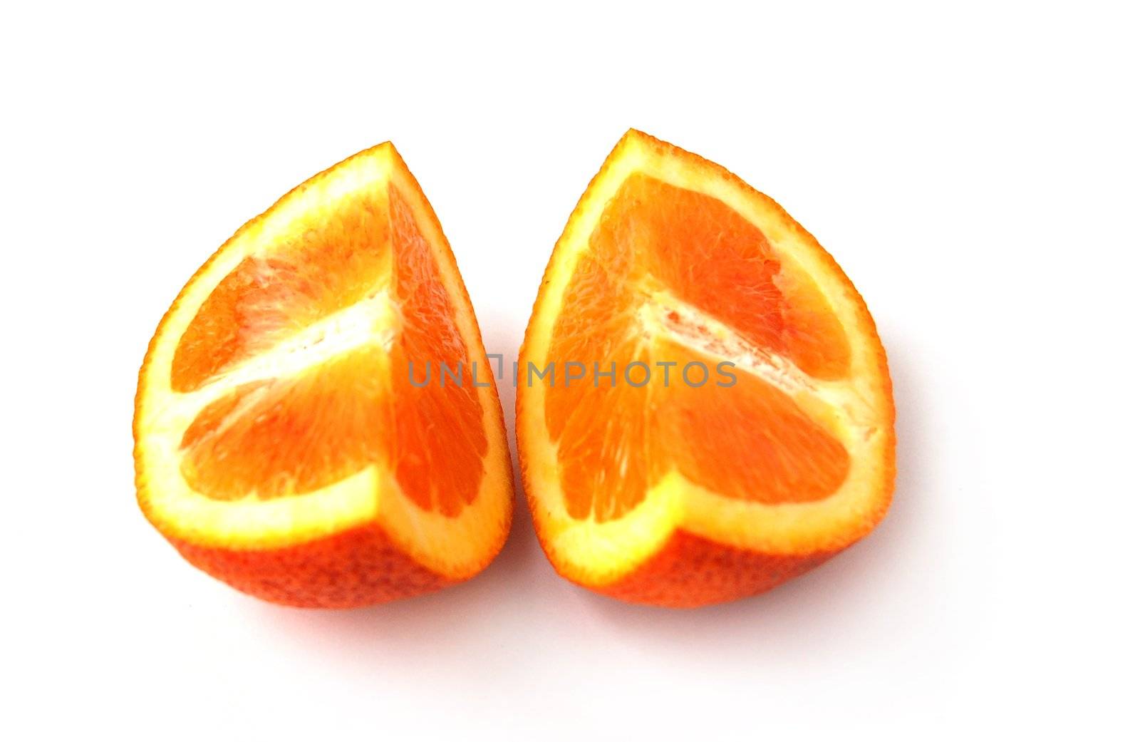 two quarters of orange with rough surface pattern isolated on white