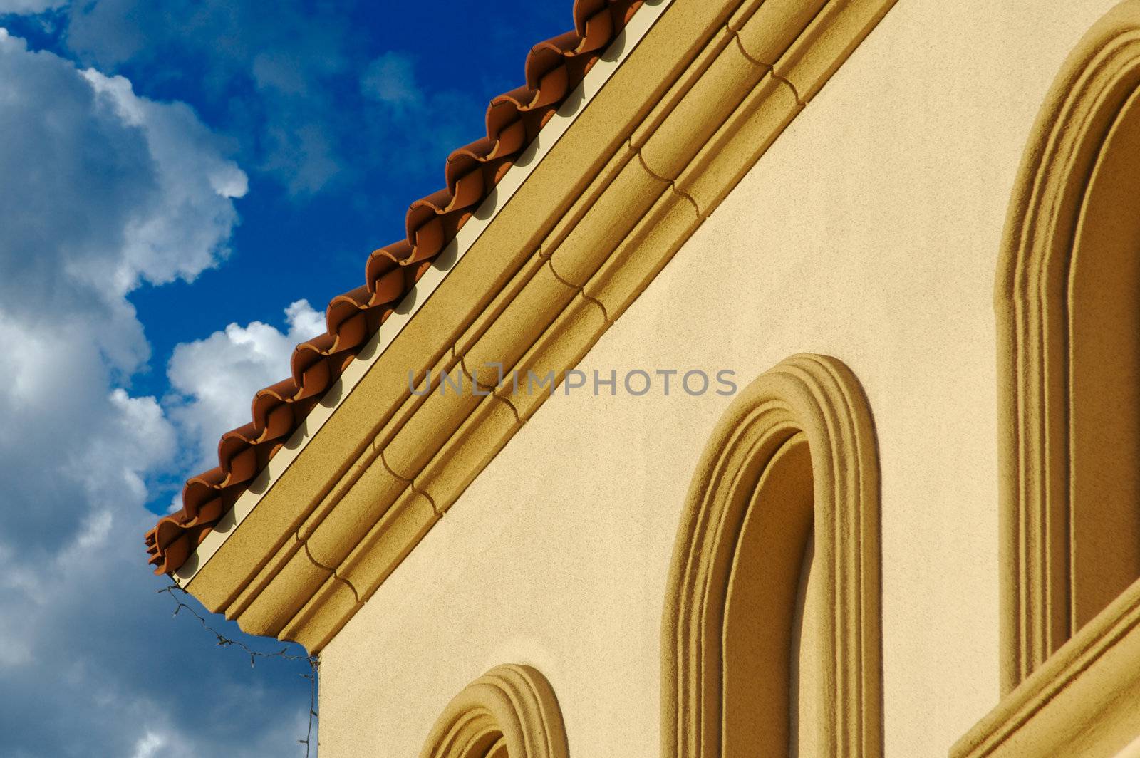 Abstract of New Stucco Wall Construction & Arched Windows