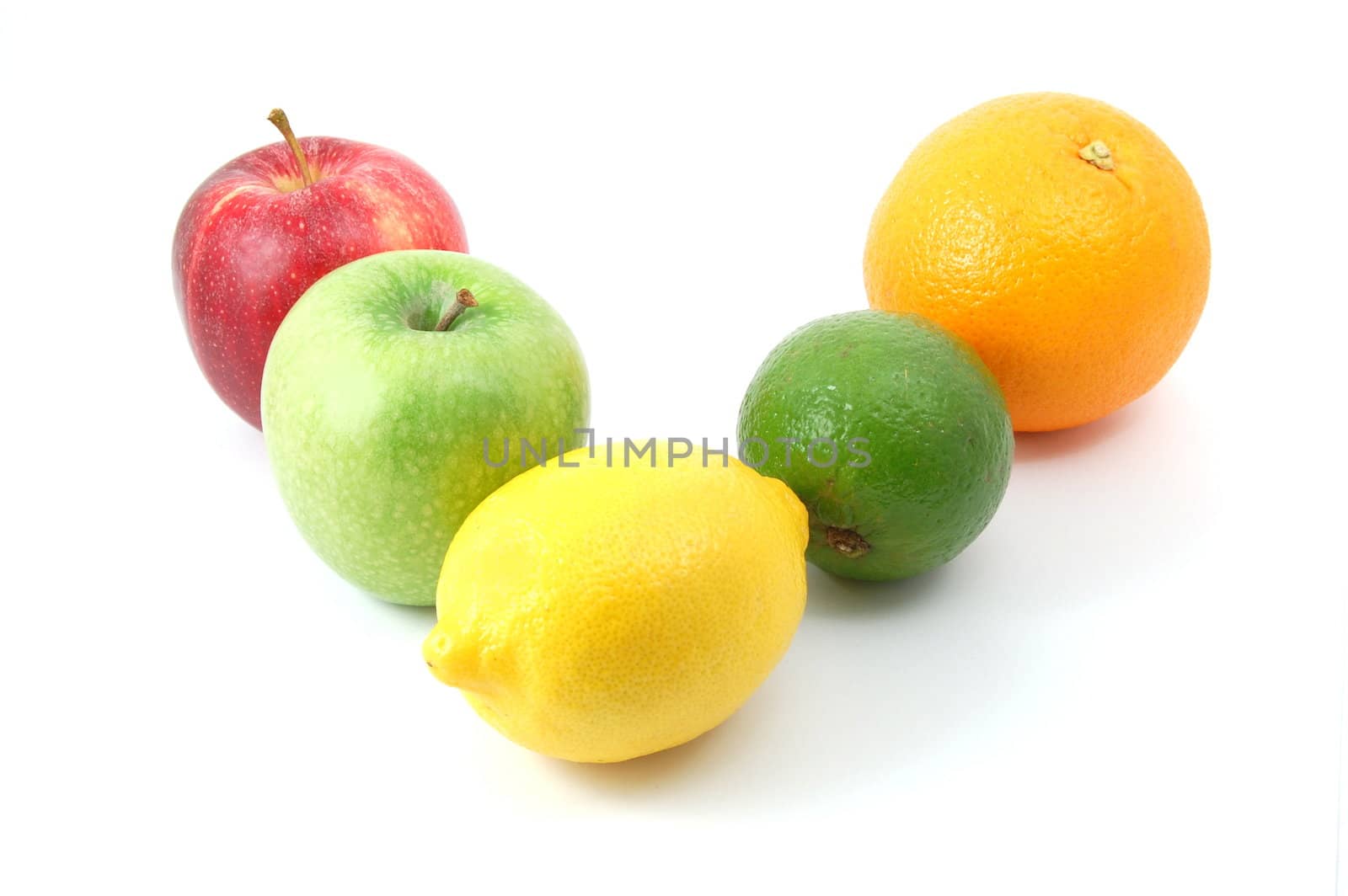 fruits like apple , lemon , citron orange and lime isolated on a white background