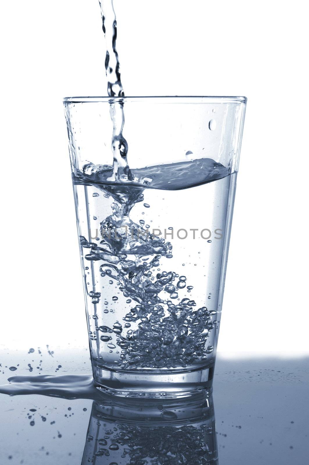 glass of fresh cool water on white background