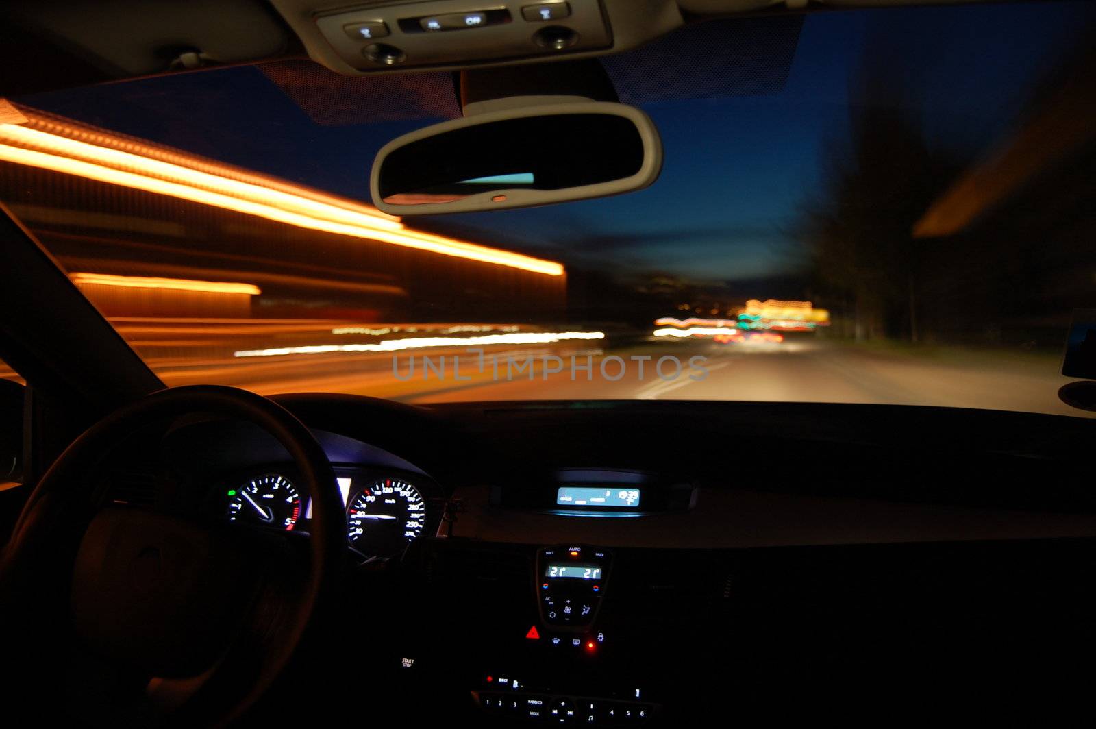 night drive with car in motion through the city shows the speed