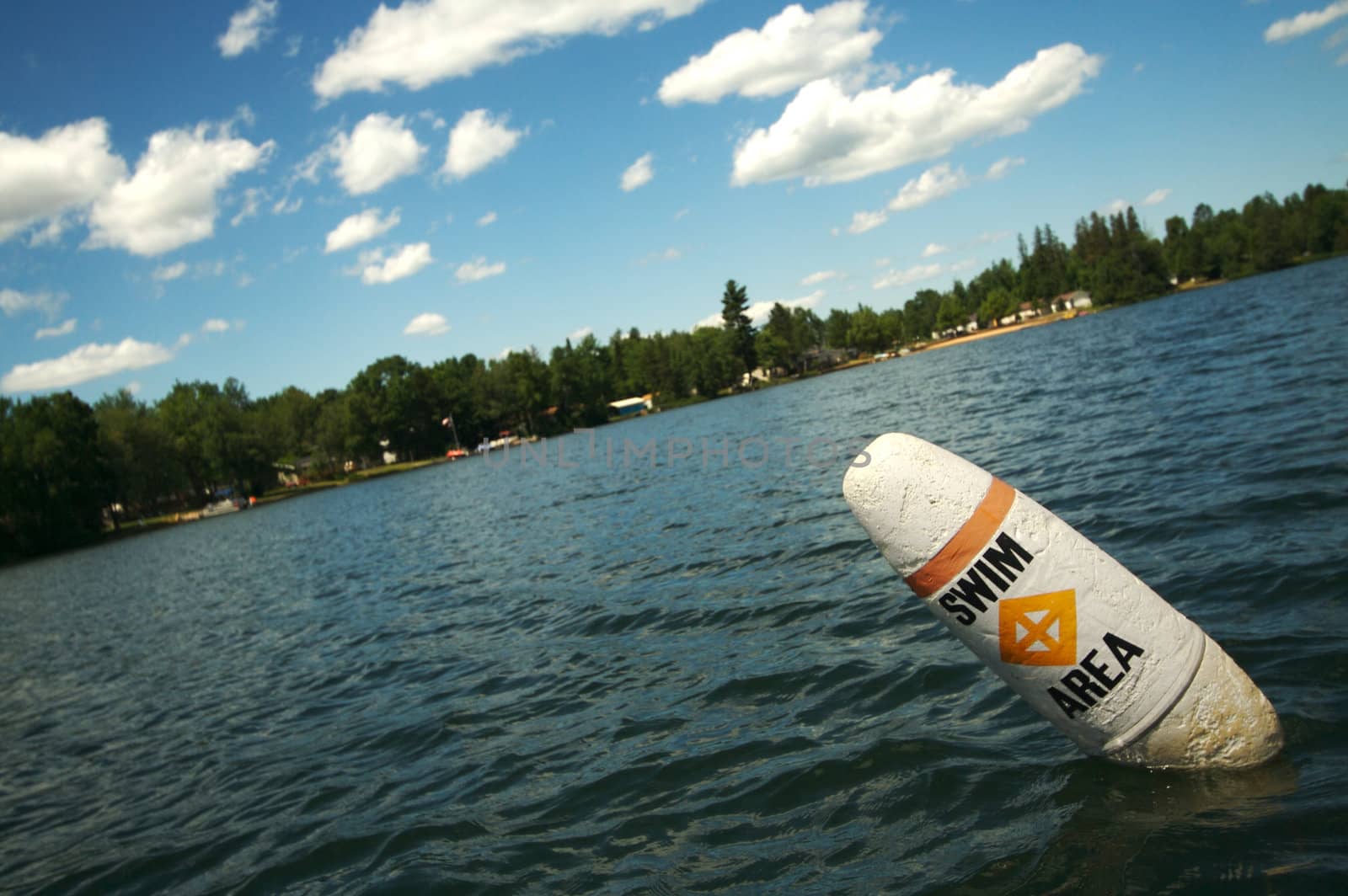 Lake Scene & Swim Area Buoy On A Summer Da