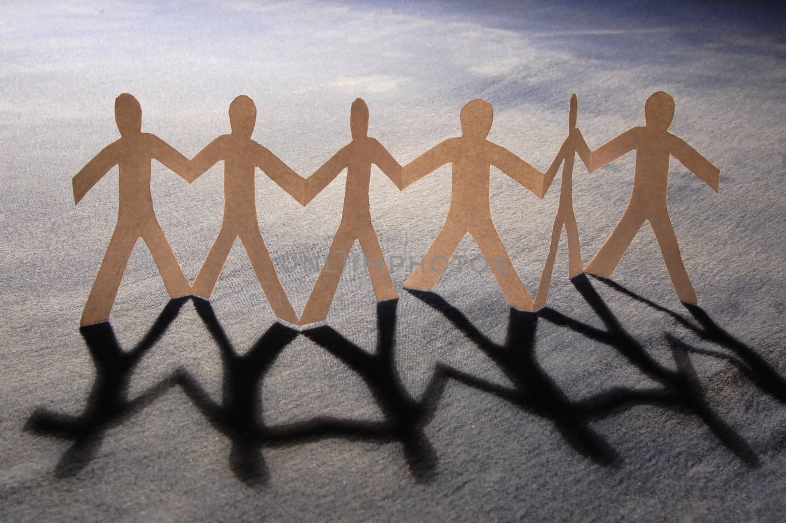 paper people doing teamwork in their business
