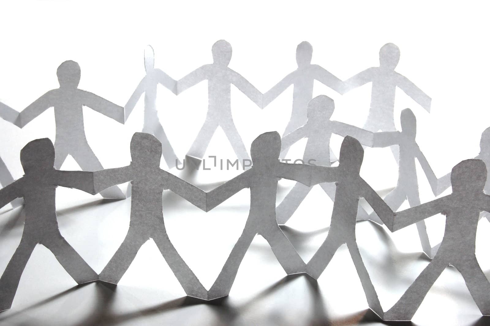 paper people doing teamwork in their business