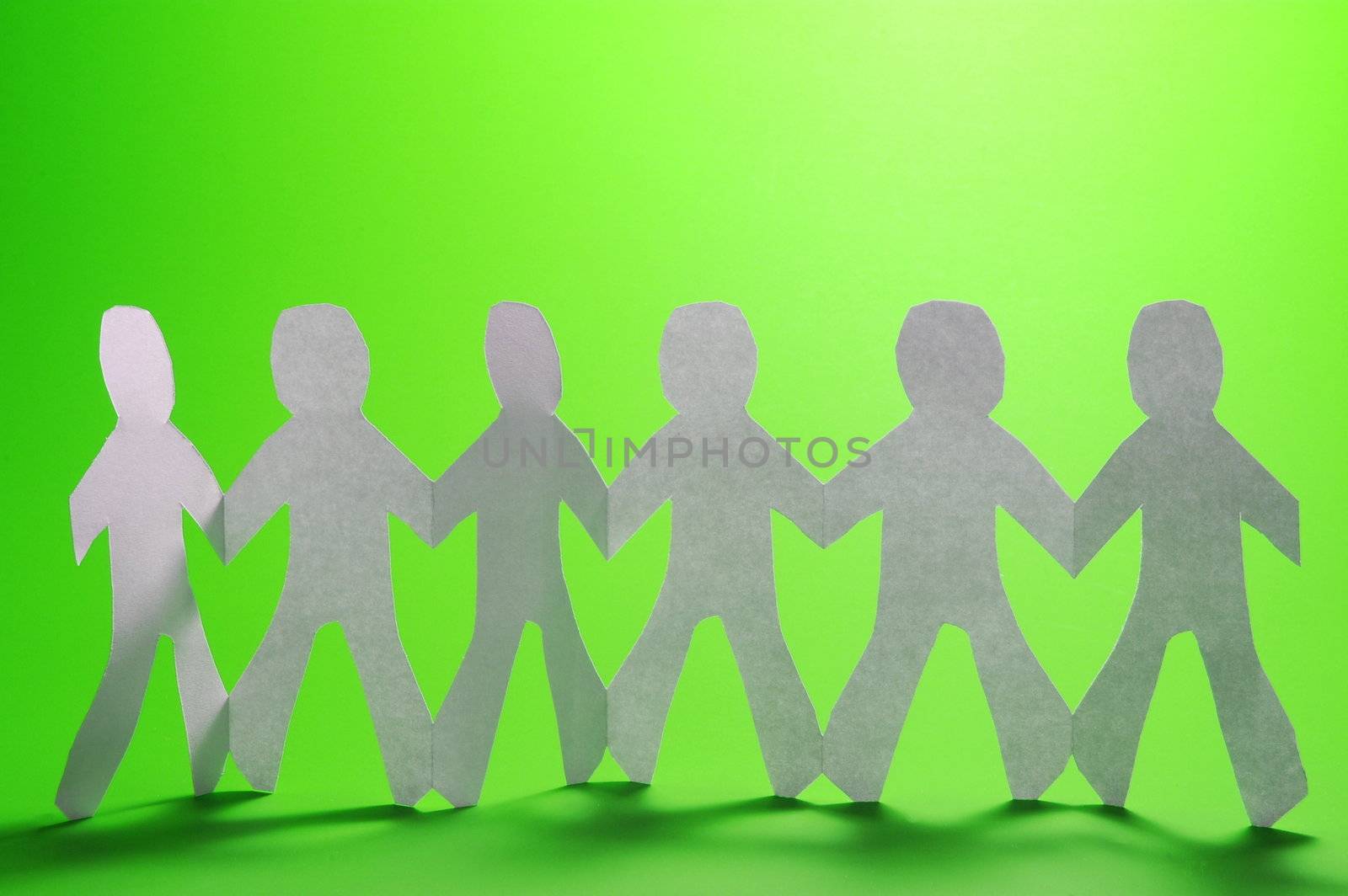 teamwork love help and family concept with paper man
