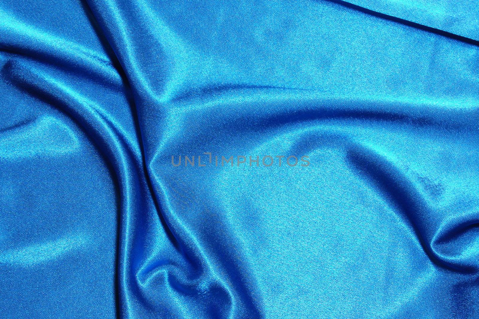 blue satin or silk background with textile texture