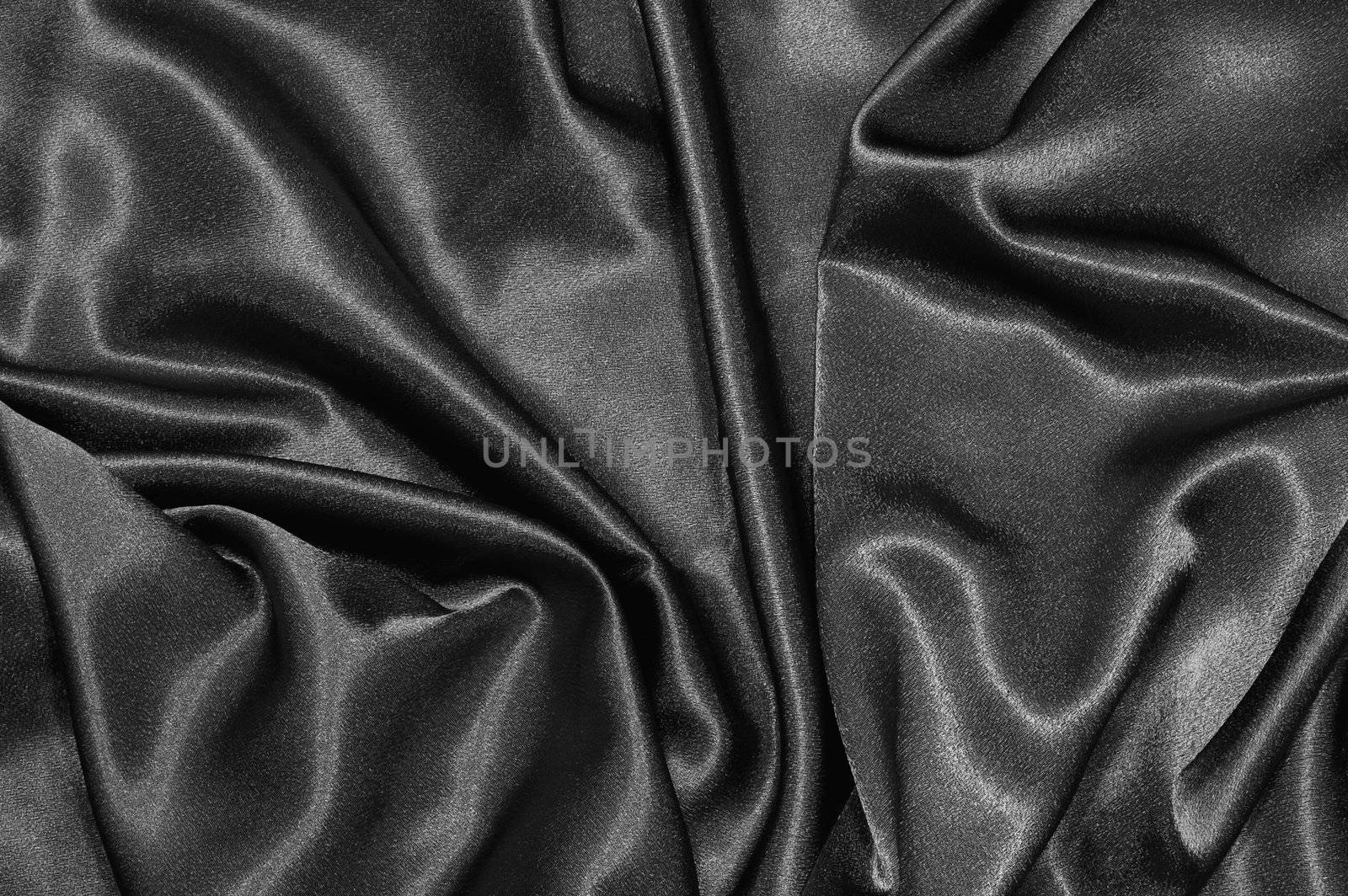black satin or silk background with textile texture