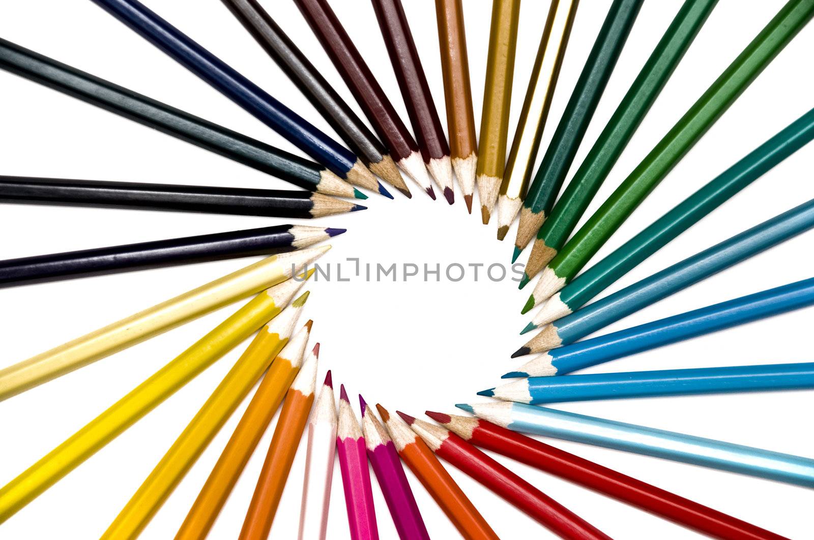 set of color pencils circle over white bacground