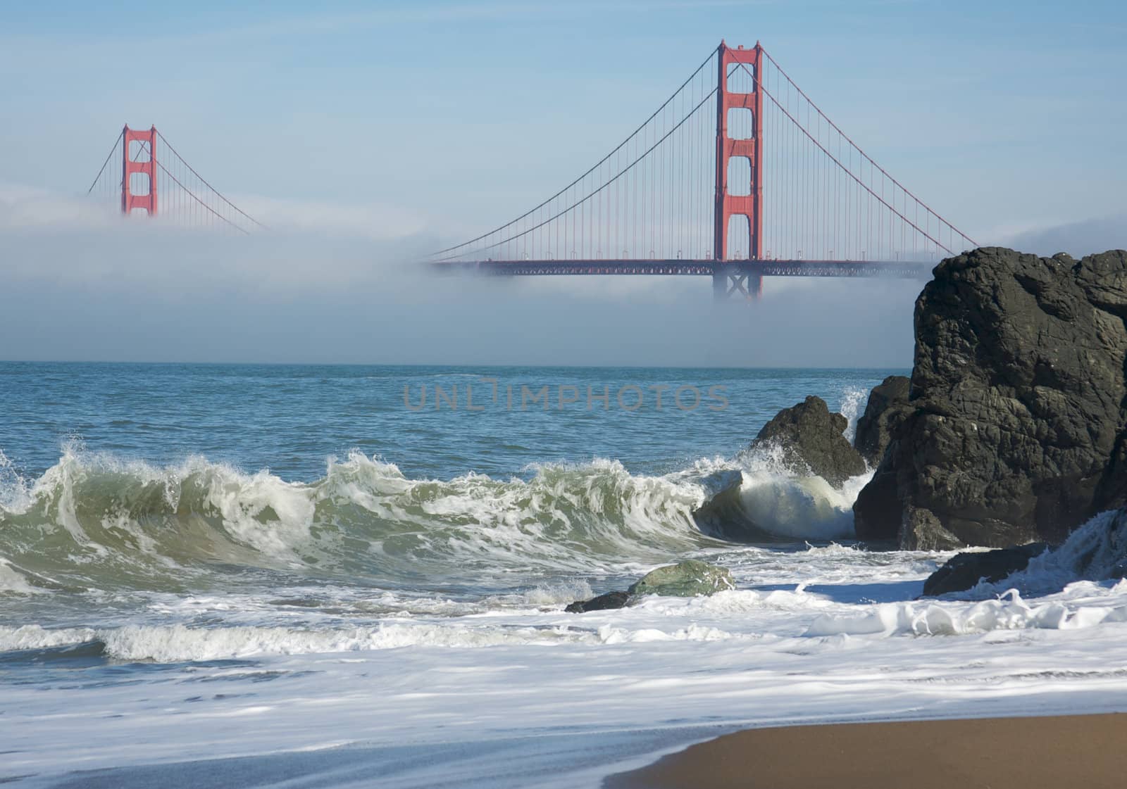 The Golden Gate Bridge in the early morning fog. San Francisco, California, United States.