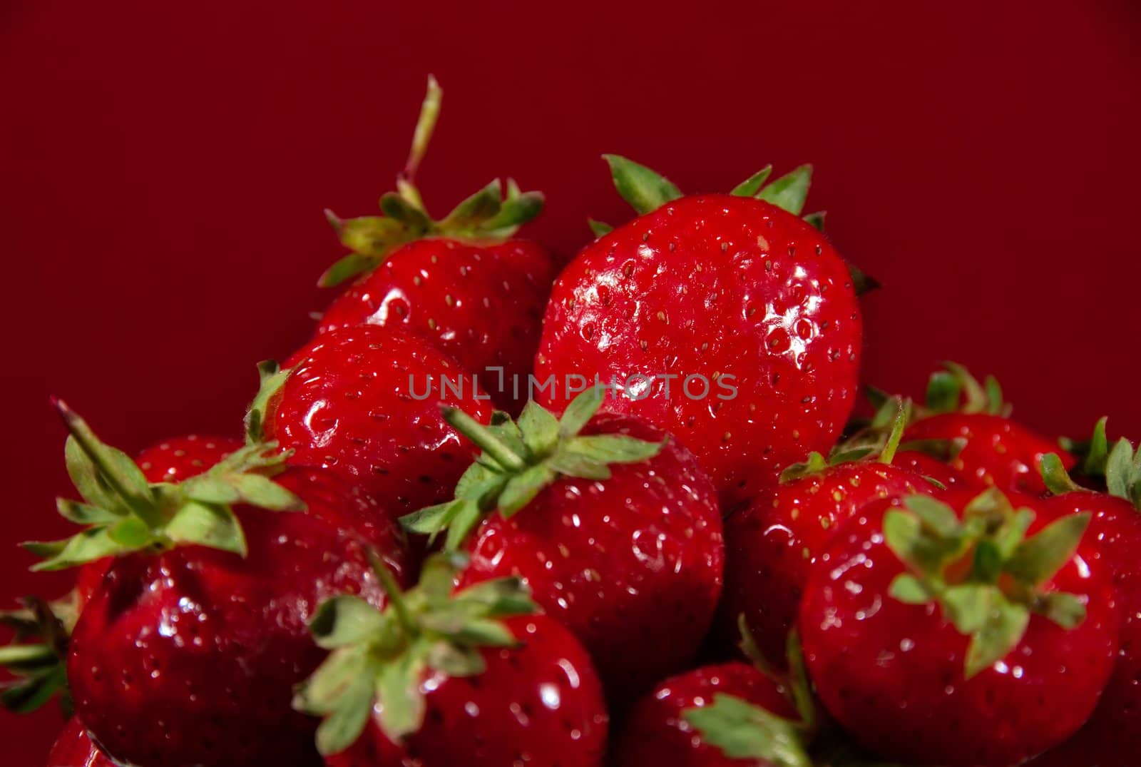 Shot of a pile of fresh strawberries