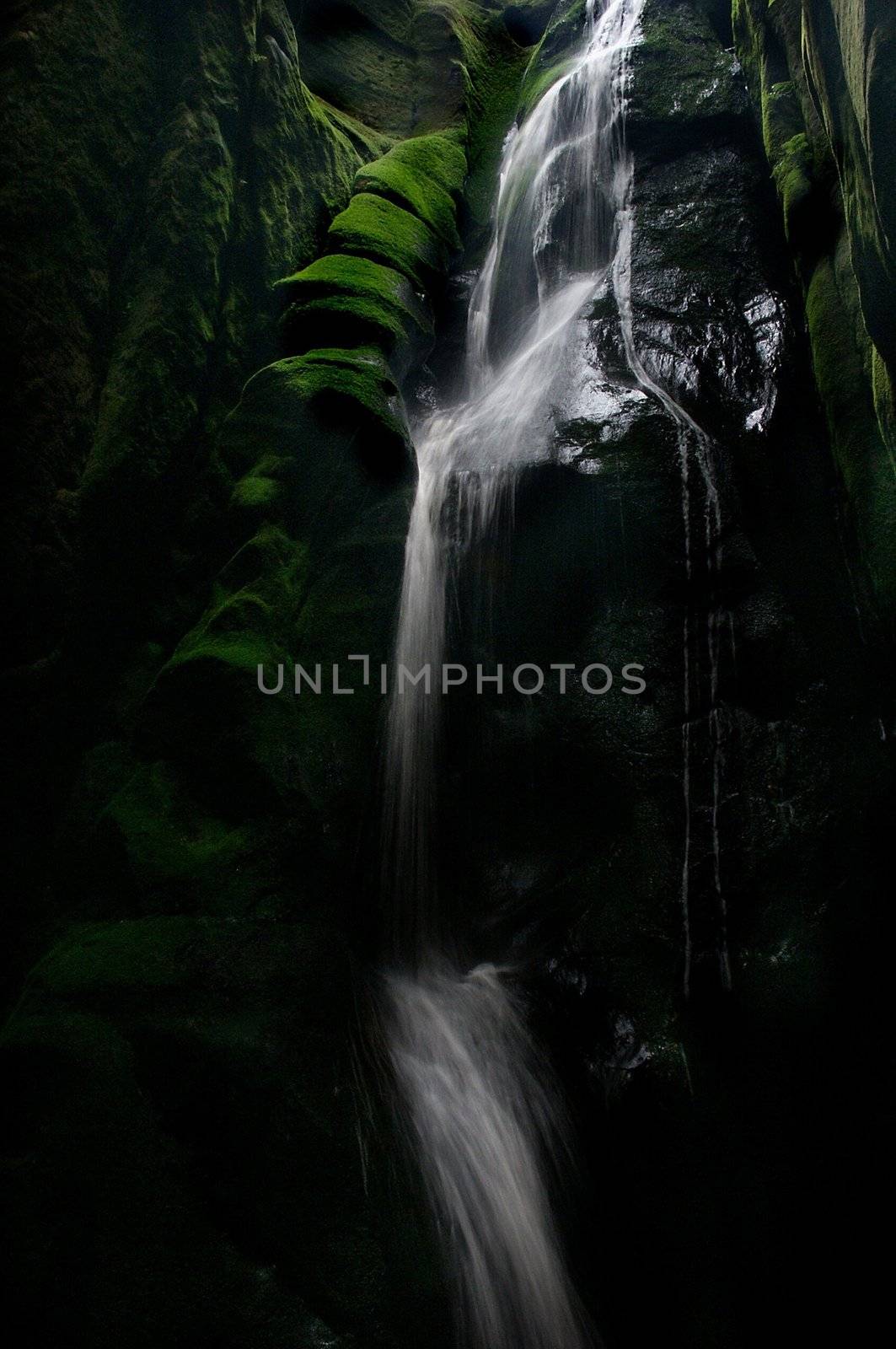 waterfall in  czech mountain, vertically framed picture