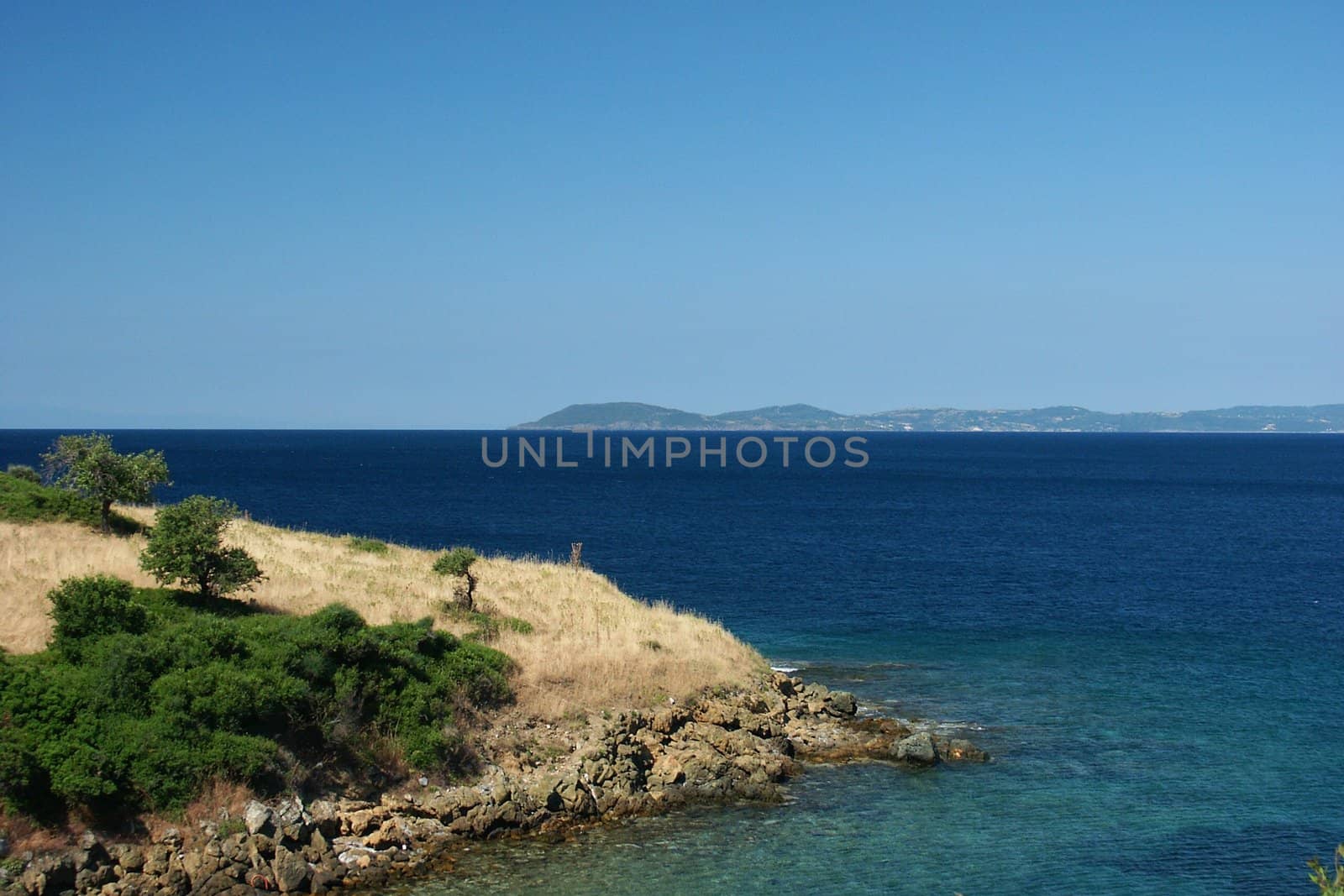 greece sea with blue sky, horizontally framed shot