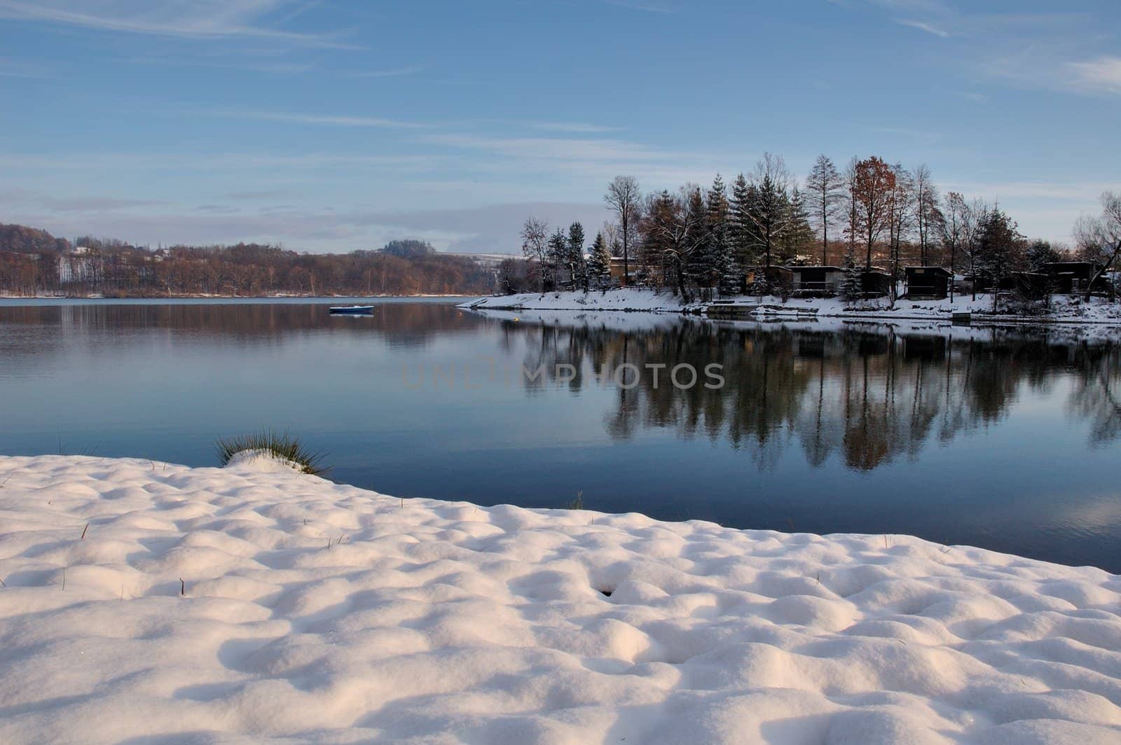 winter  lake in czech repblic with snow and blue sky
