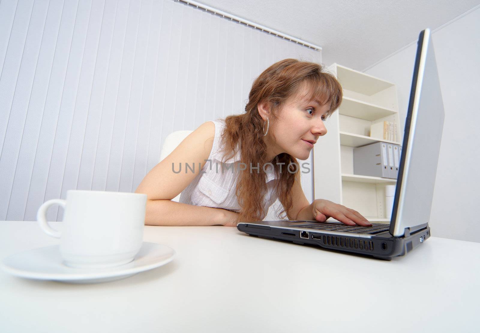 Young woman keen on watching pornographic sites on the Internet