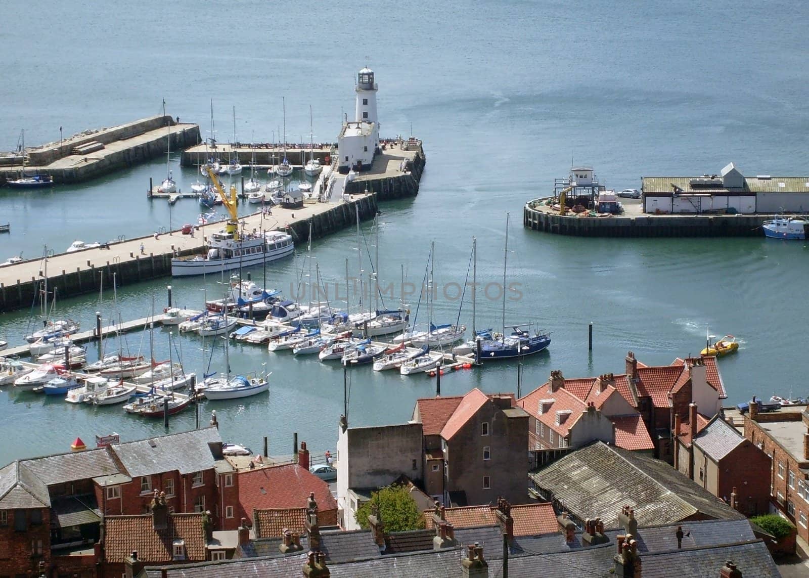 Old town and harbor in resort of Scarborough, England.