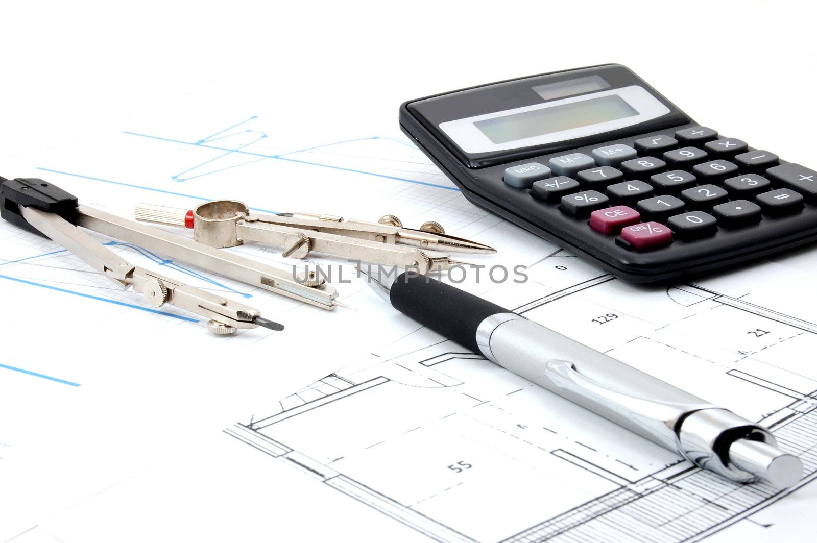architecture or business still life with plans as background