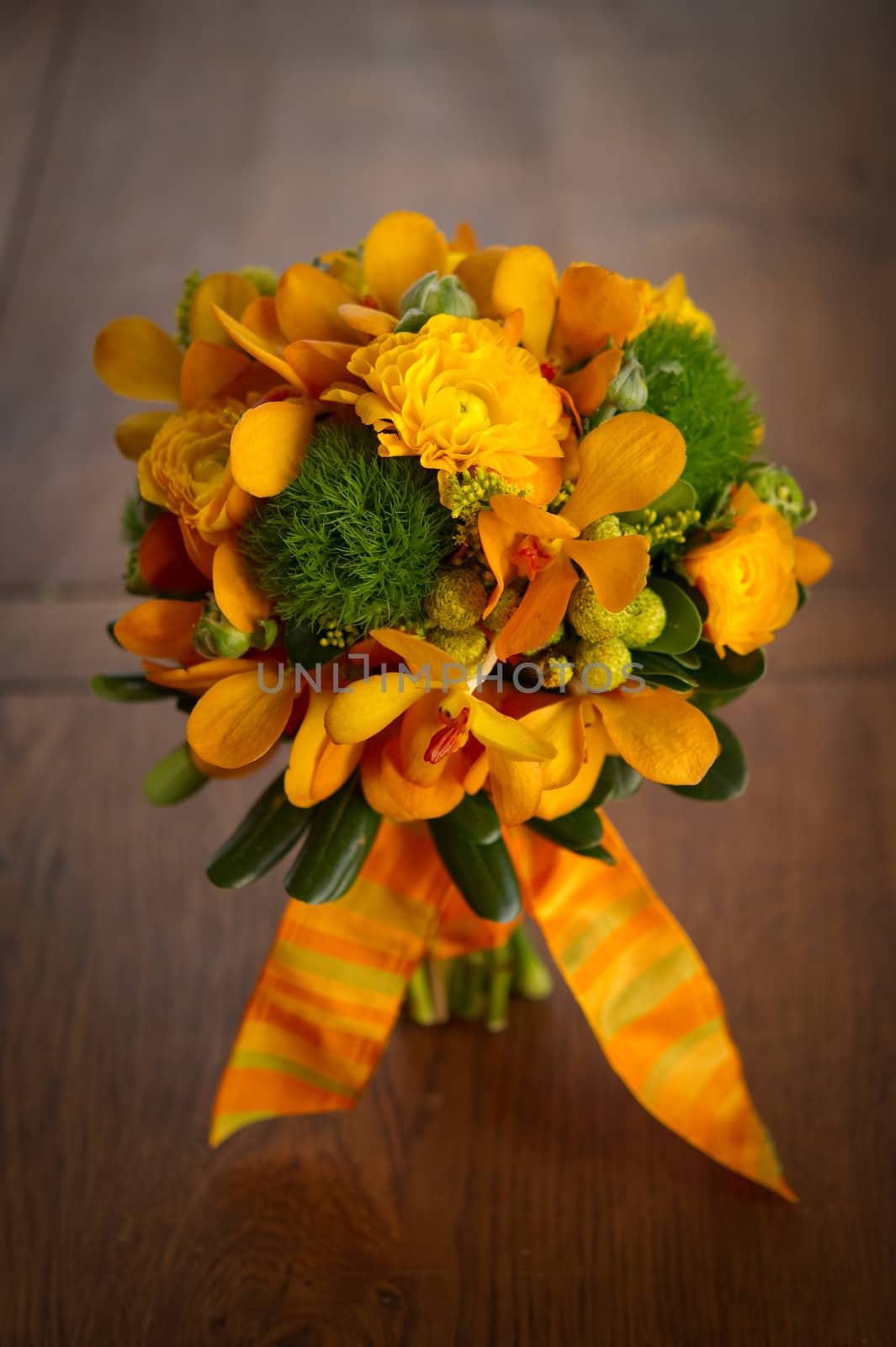 Image of a beautiful floral bouquet on wood table