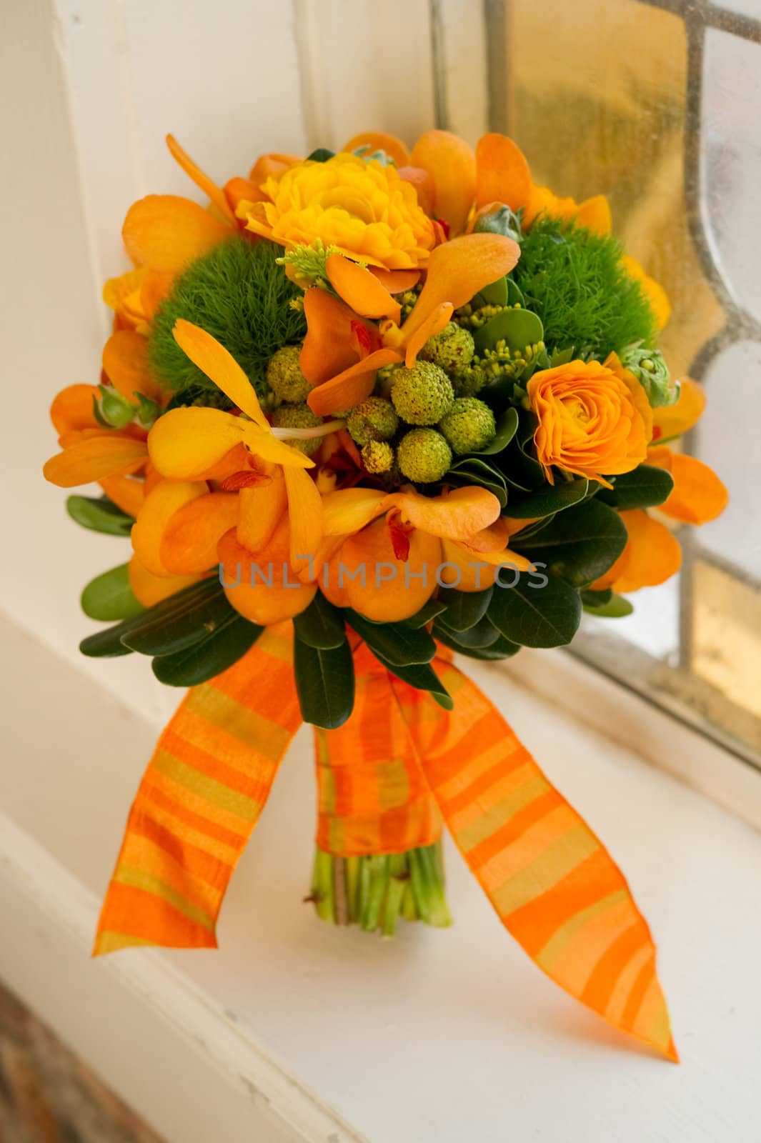 Image of a beautiful floral bouquet in window sill