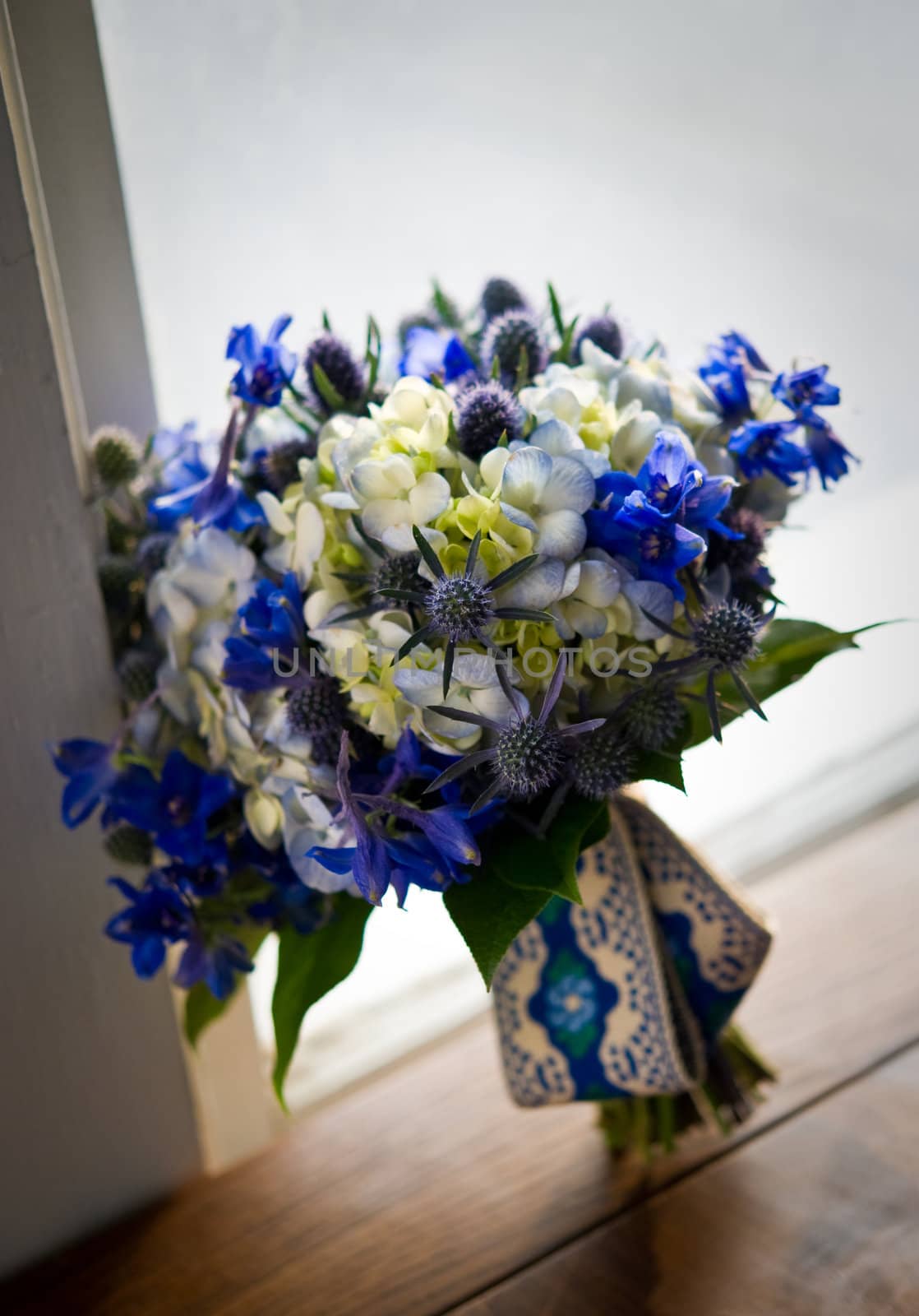 Image of a beautiful floral bouquet on wood table