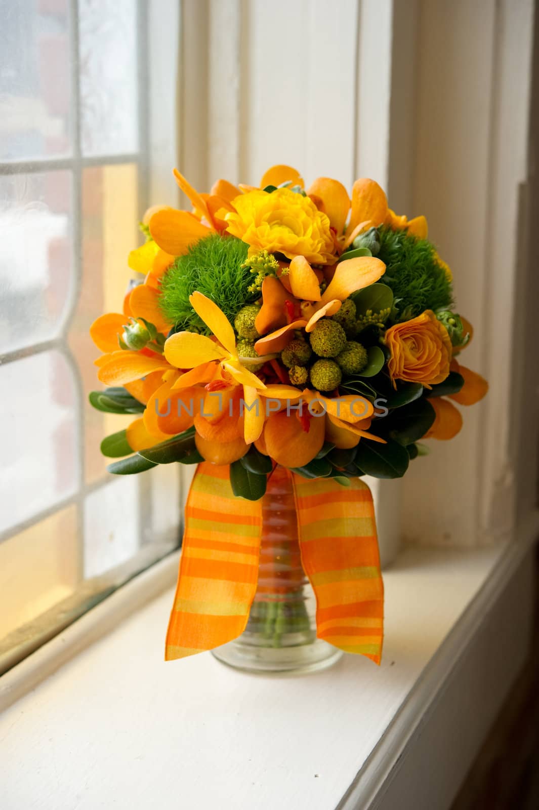 Image of a beautiful floral bouquet in window sill