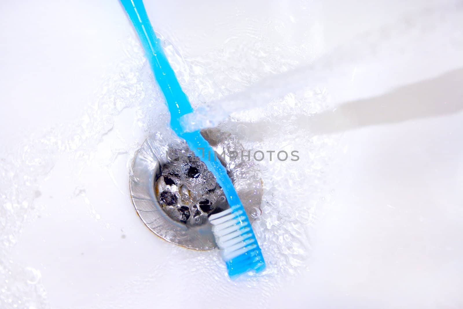 toothbrush on background of the washstand