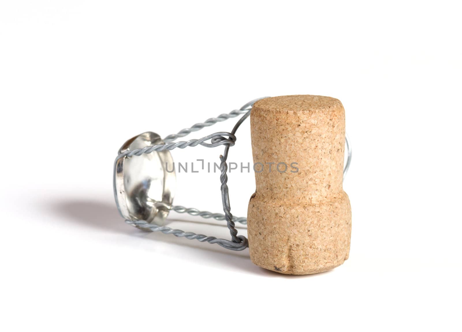 Champagne cork close up on a white background.