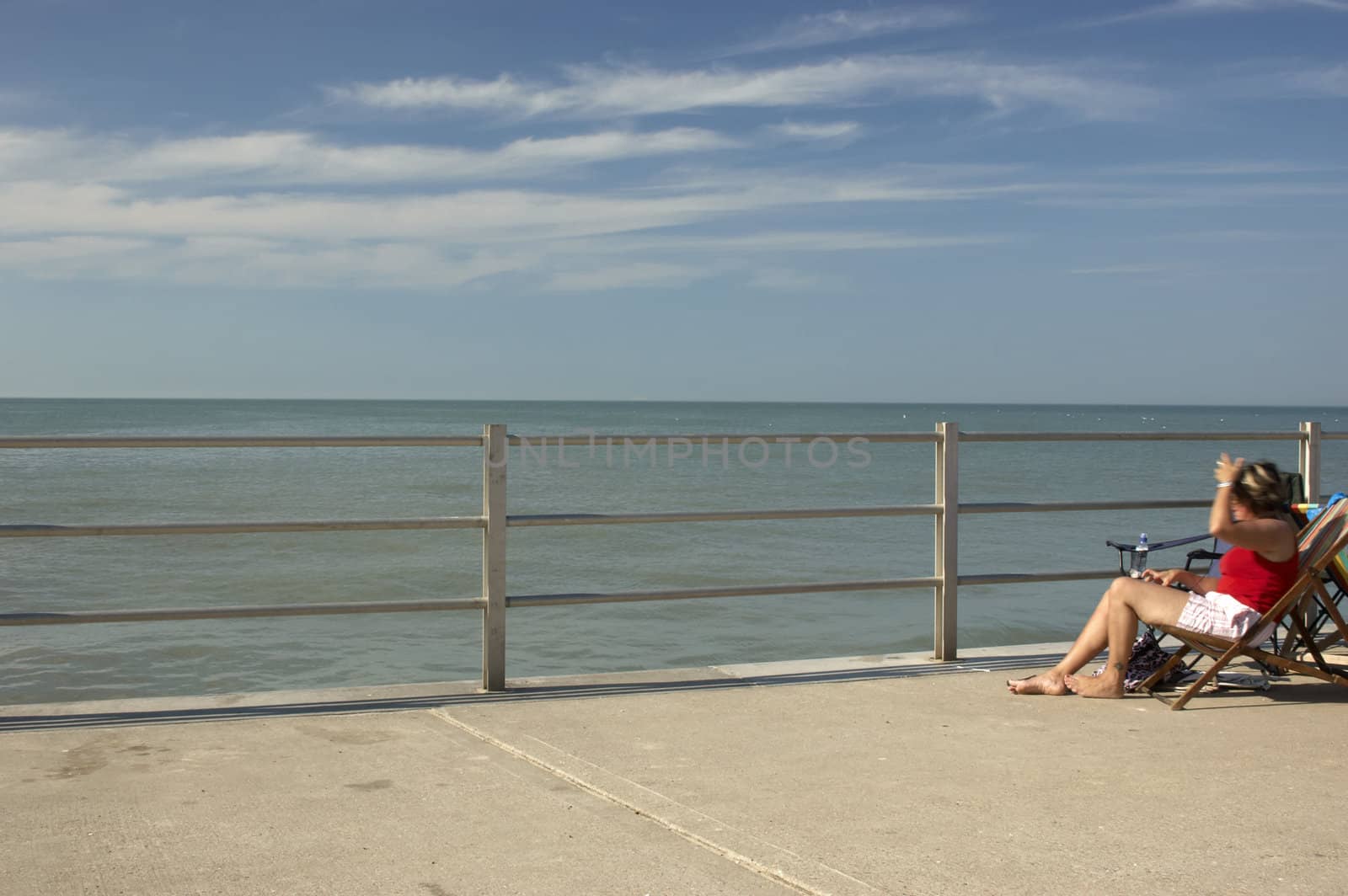 A view out too sea over the railing