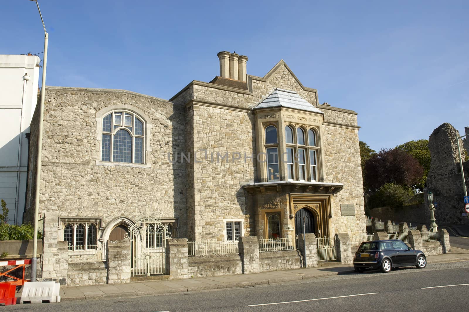 A stone house with arched windows