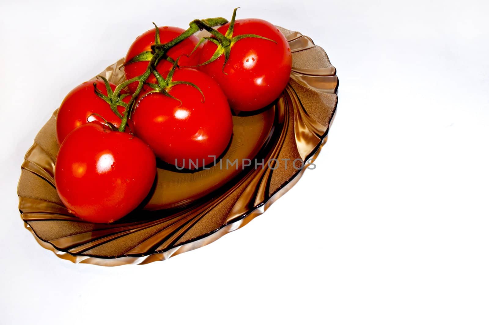 Tomato on plate by Michalowski