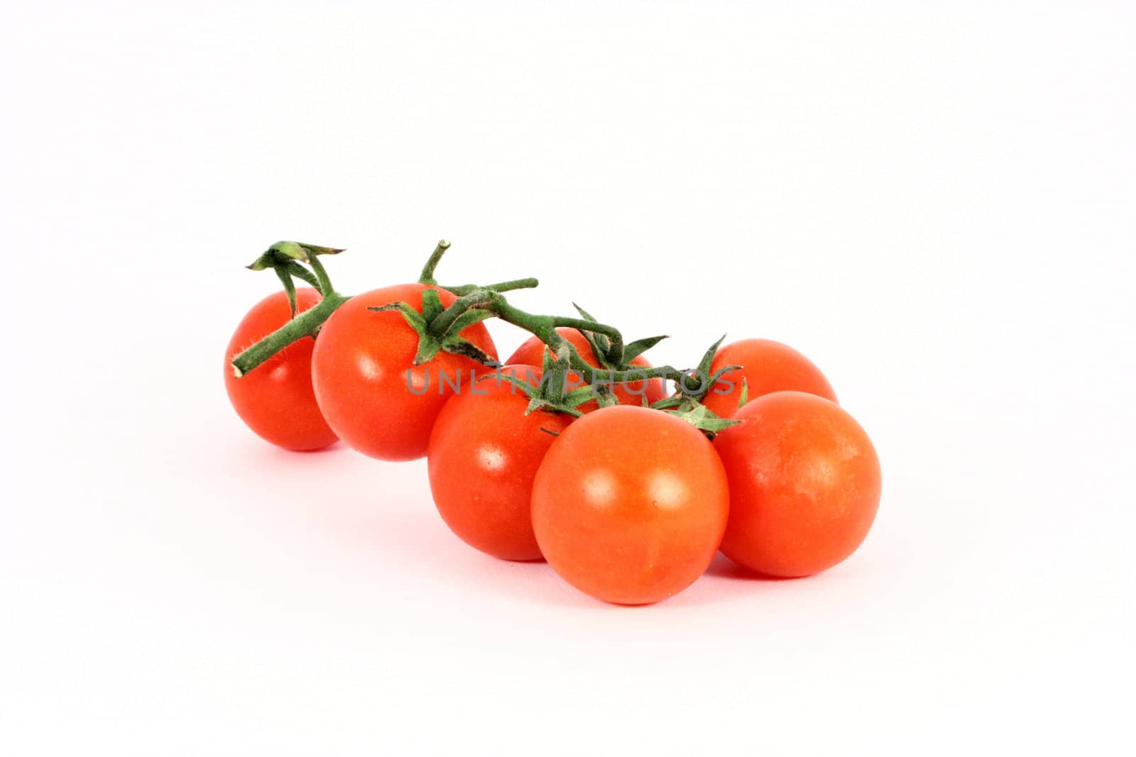 Cherry tomato isolated on white