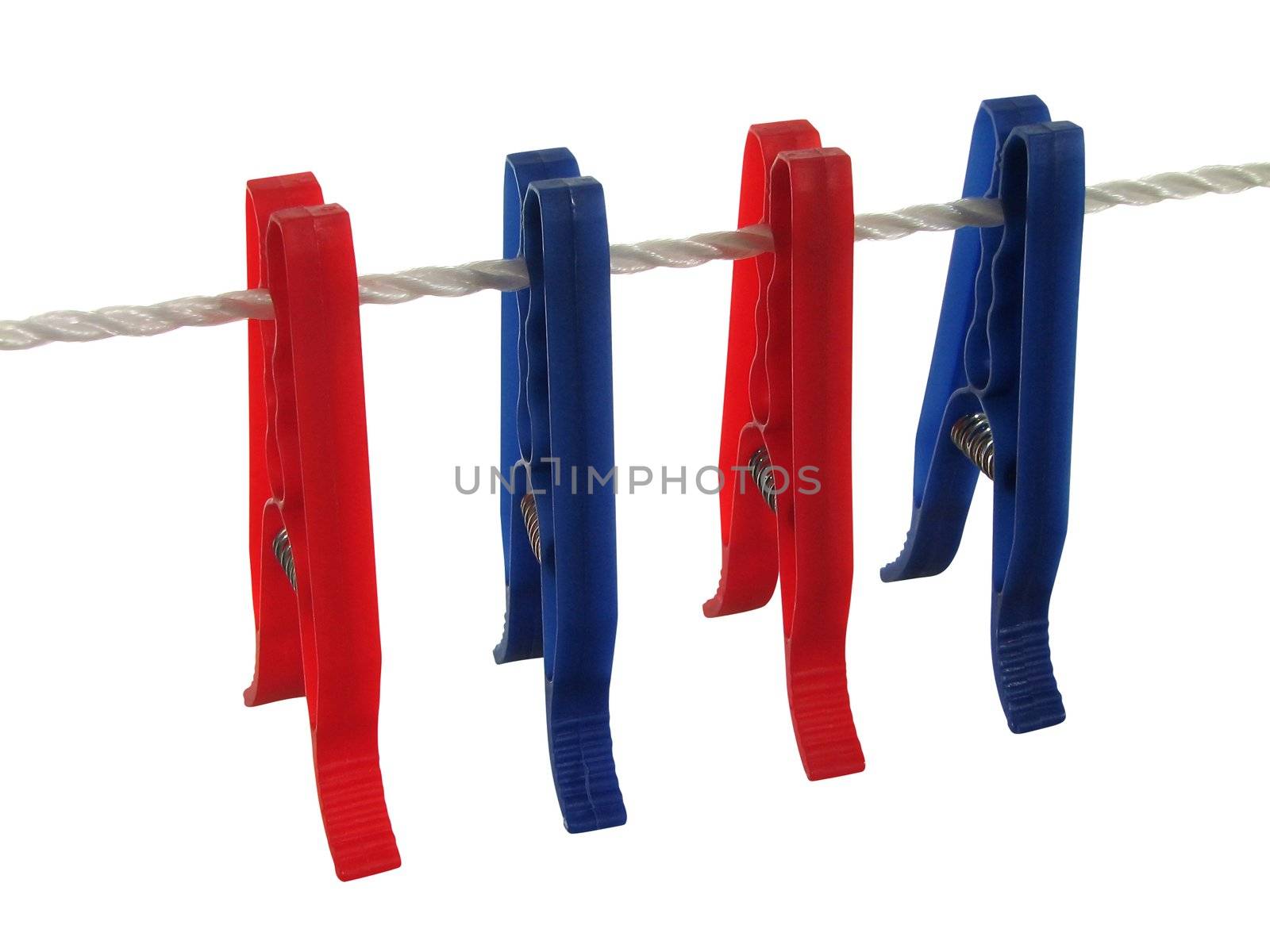 Blue and red clothespins on a clothes line (+ clipping path) by anikasalsera