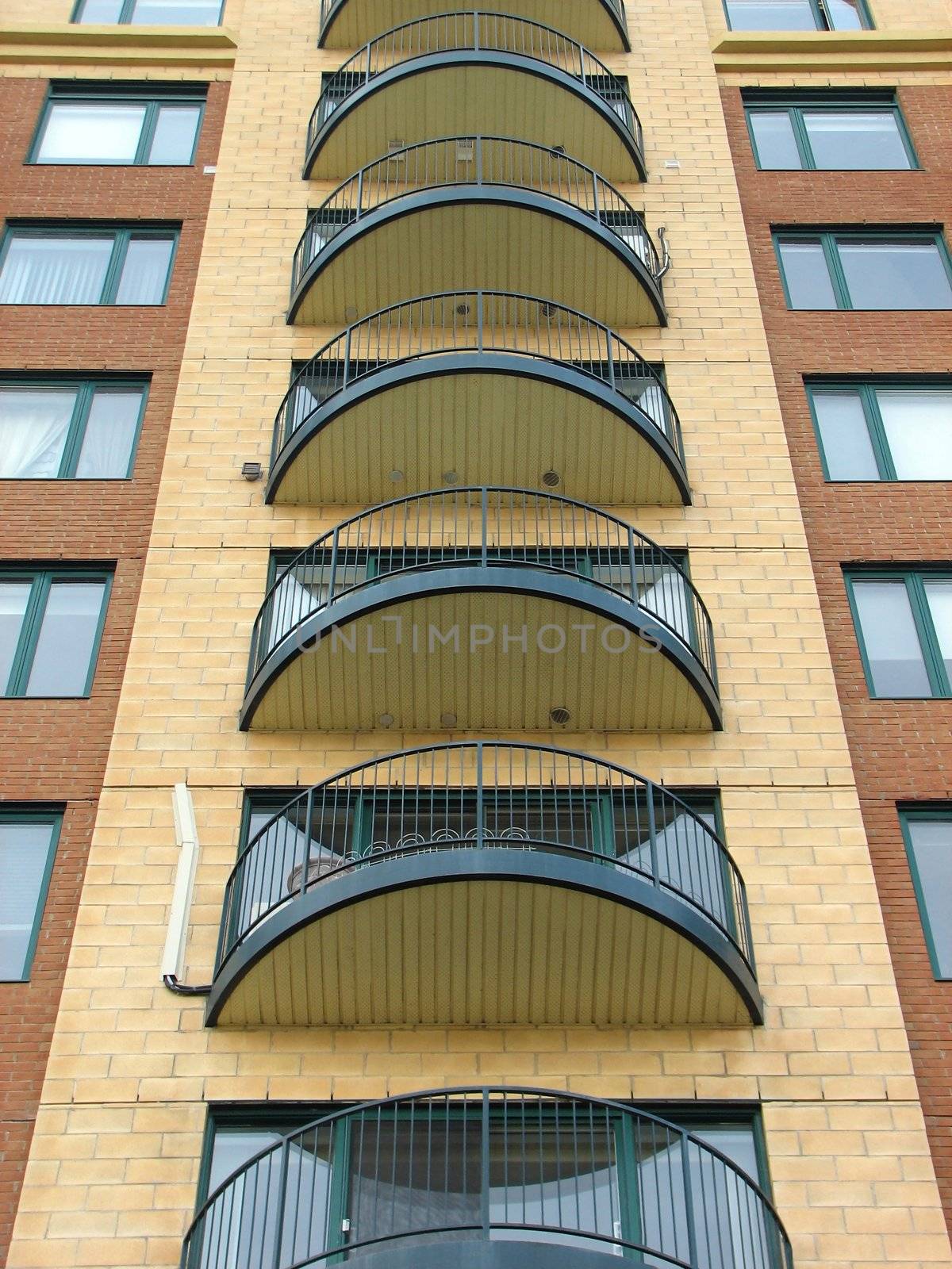 Urban housing. Balconies of a newly constructed highrise apartment building.