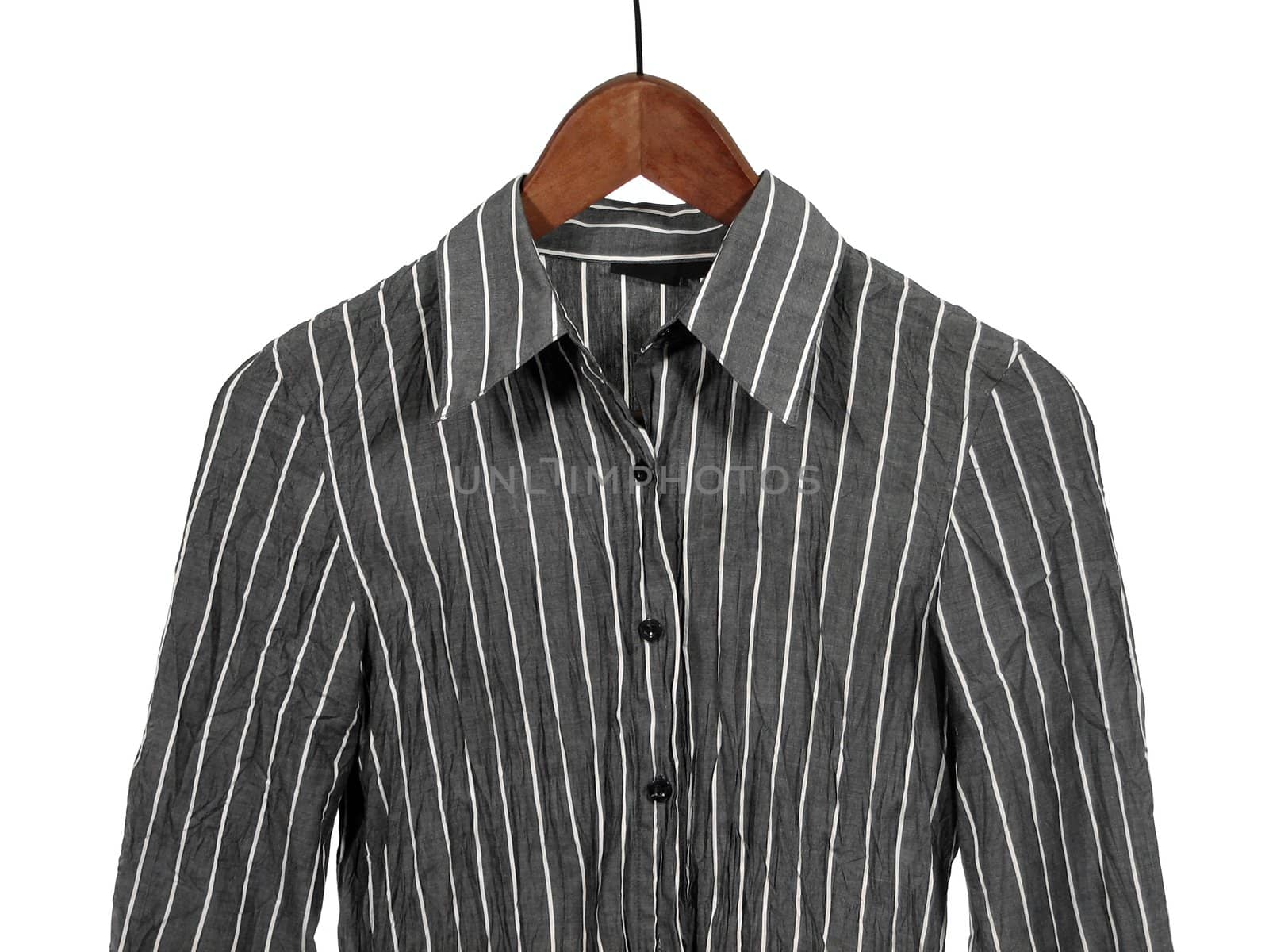 Stylish gray striped shirt on wooden hanger, isolated on white.