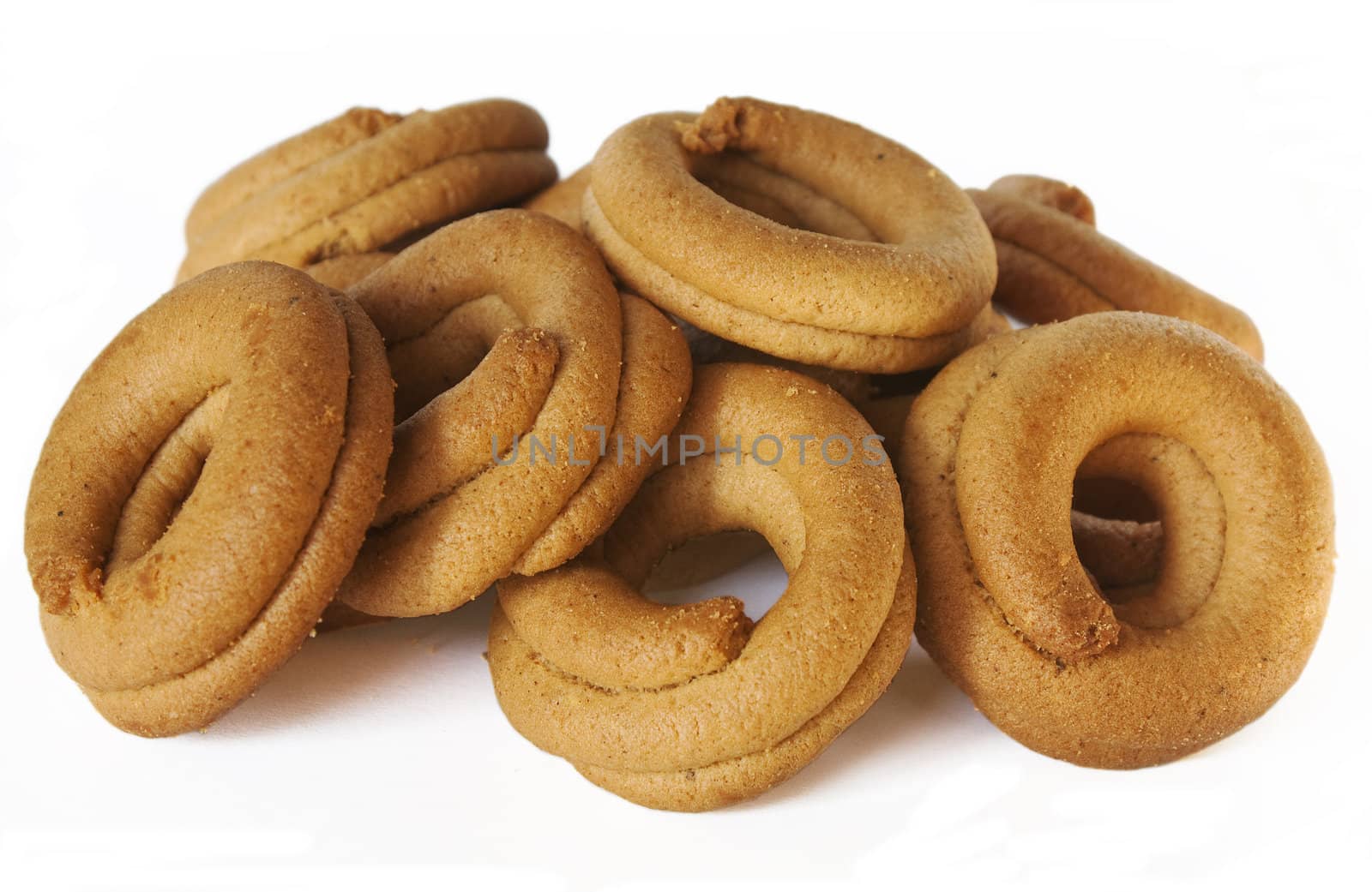 Greek grape juice biscuits isolated over a white background.