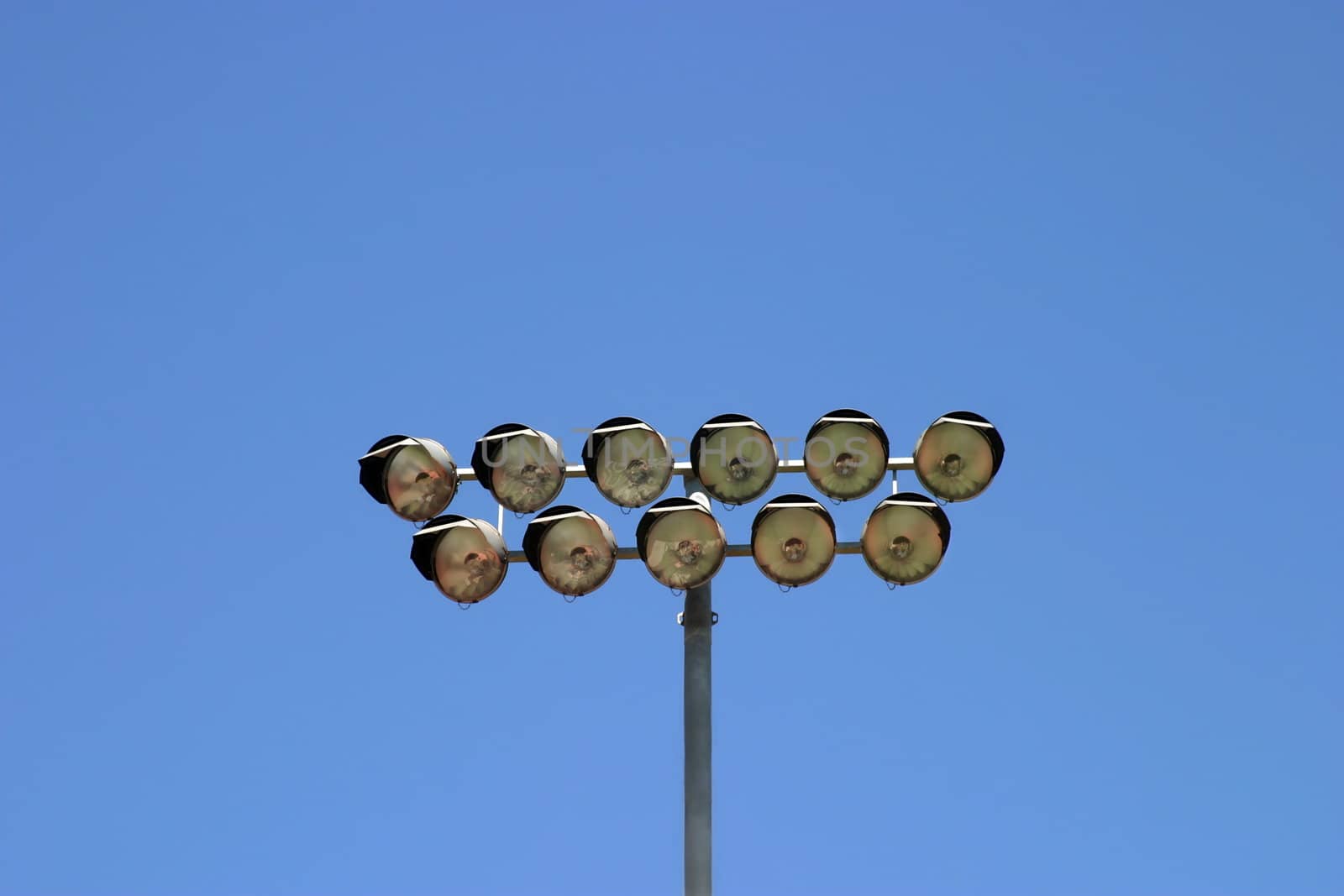 Floodlight from a football stadium with the sky as a background.