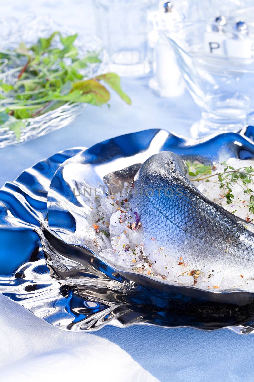 River trout on the plate and salad