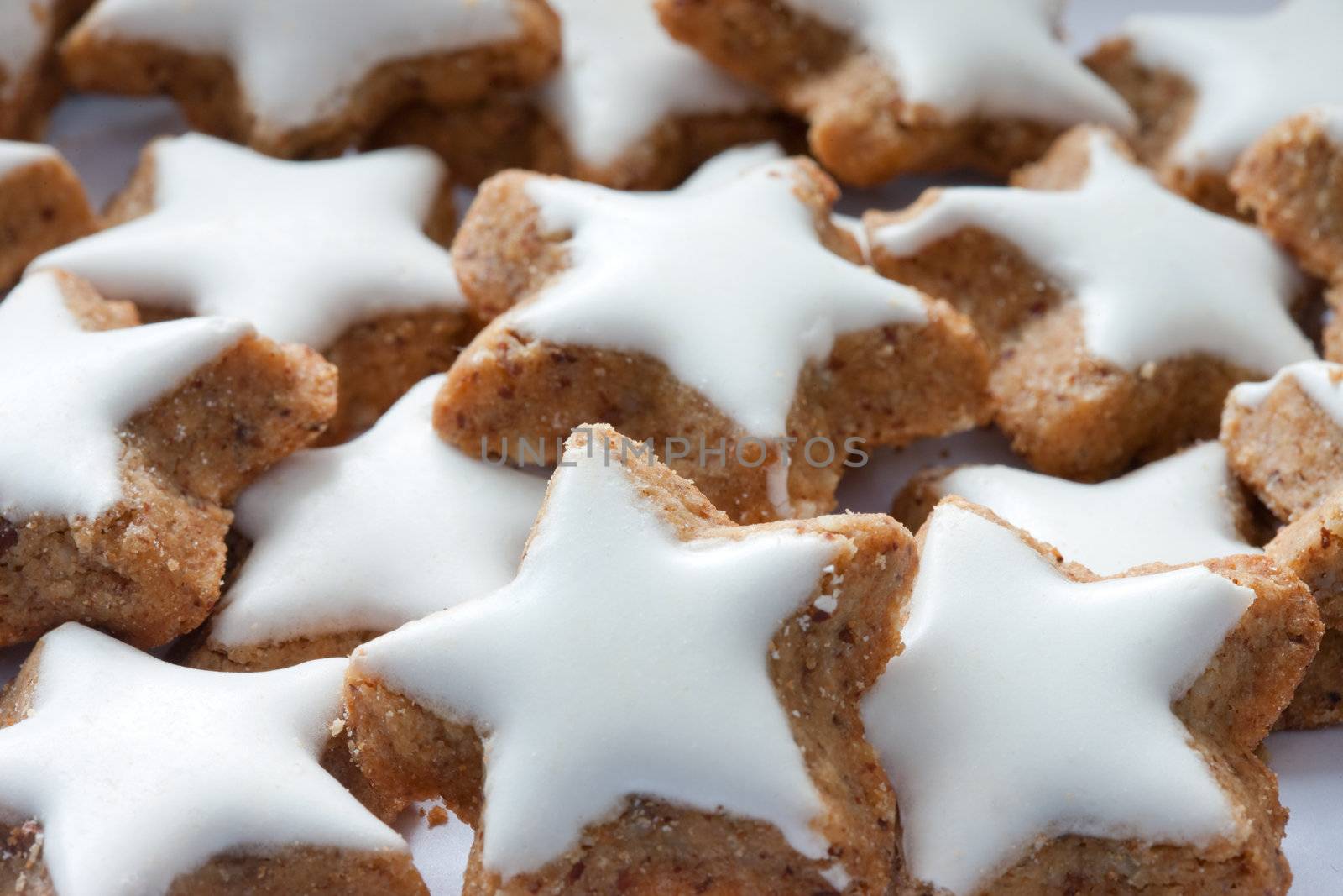 Traditional holliday homemade star-shaped sugar iced cookies