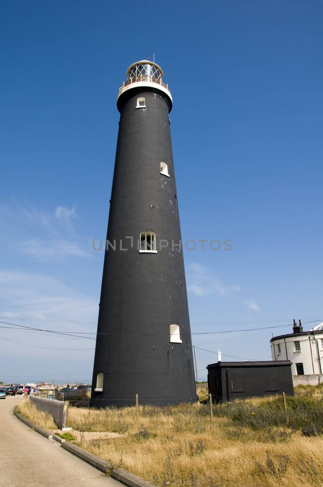 A black lighthouse at Dungeness, Kent, England