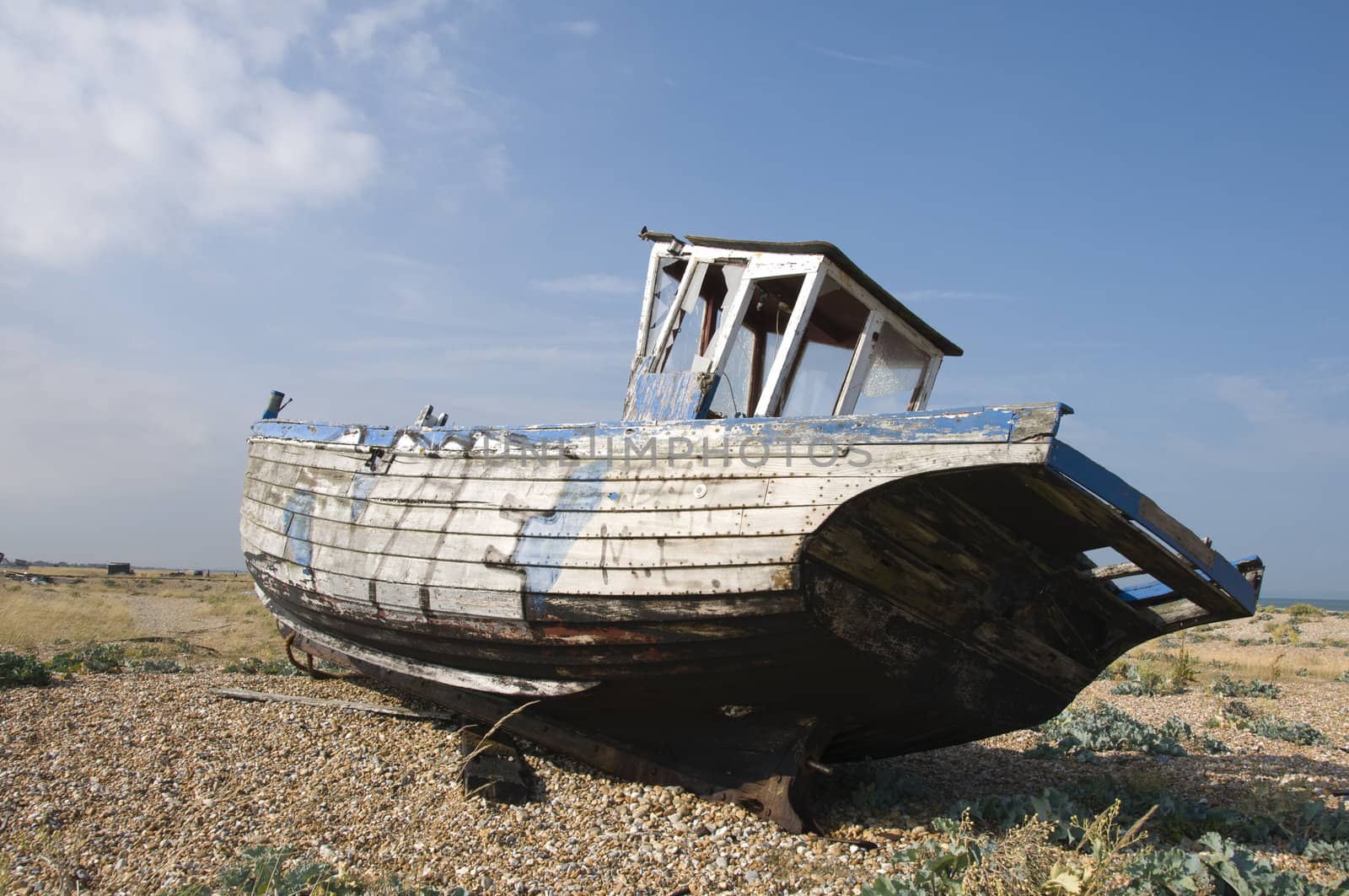 An old fishing boat on the beach at Dungeness