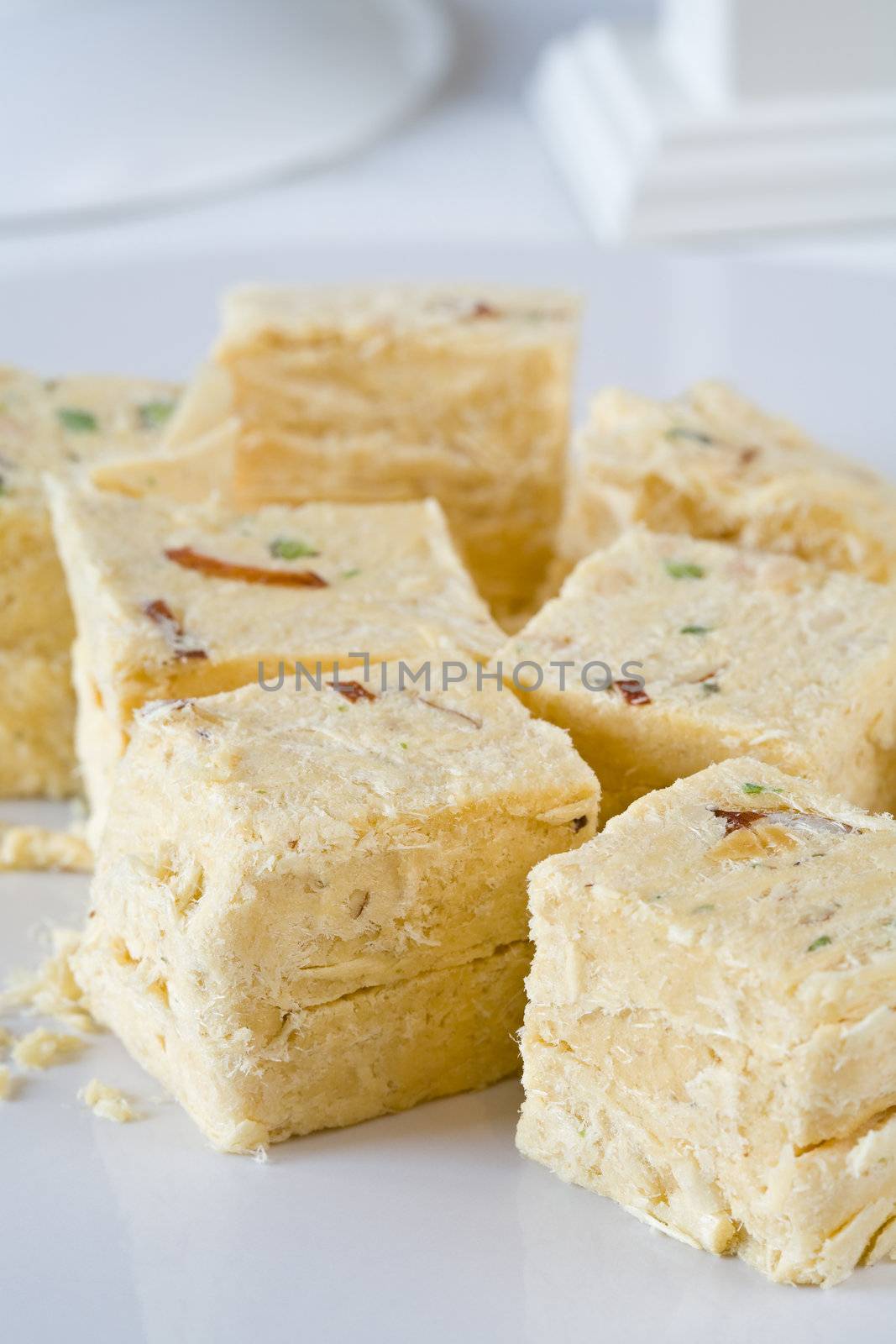 Traditional eastern pistachio halva sliced into cubes