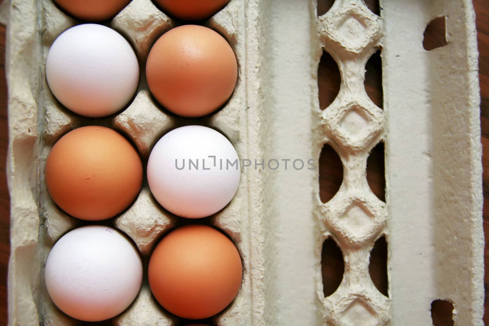 any different colored eggs in a paper carton