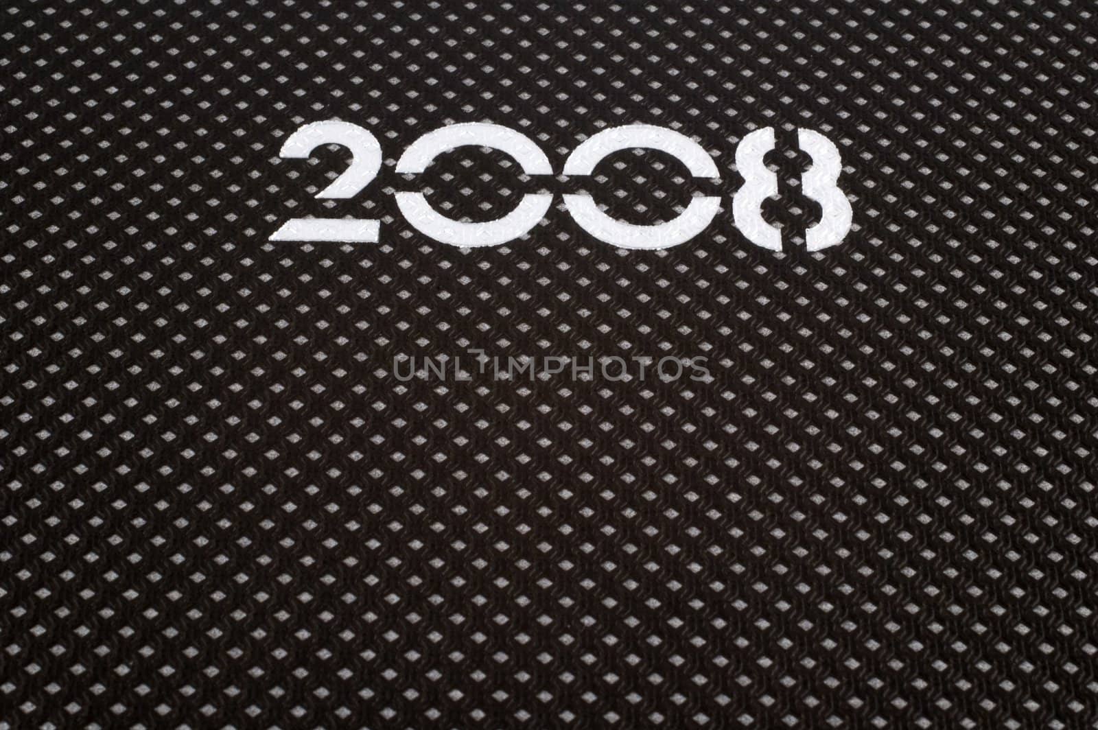 Close up of number 2008 printed on dark agenda cover