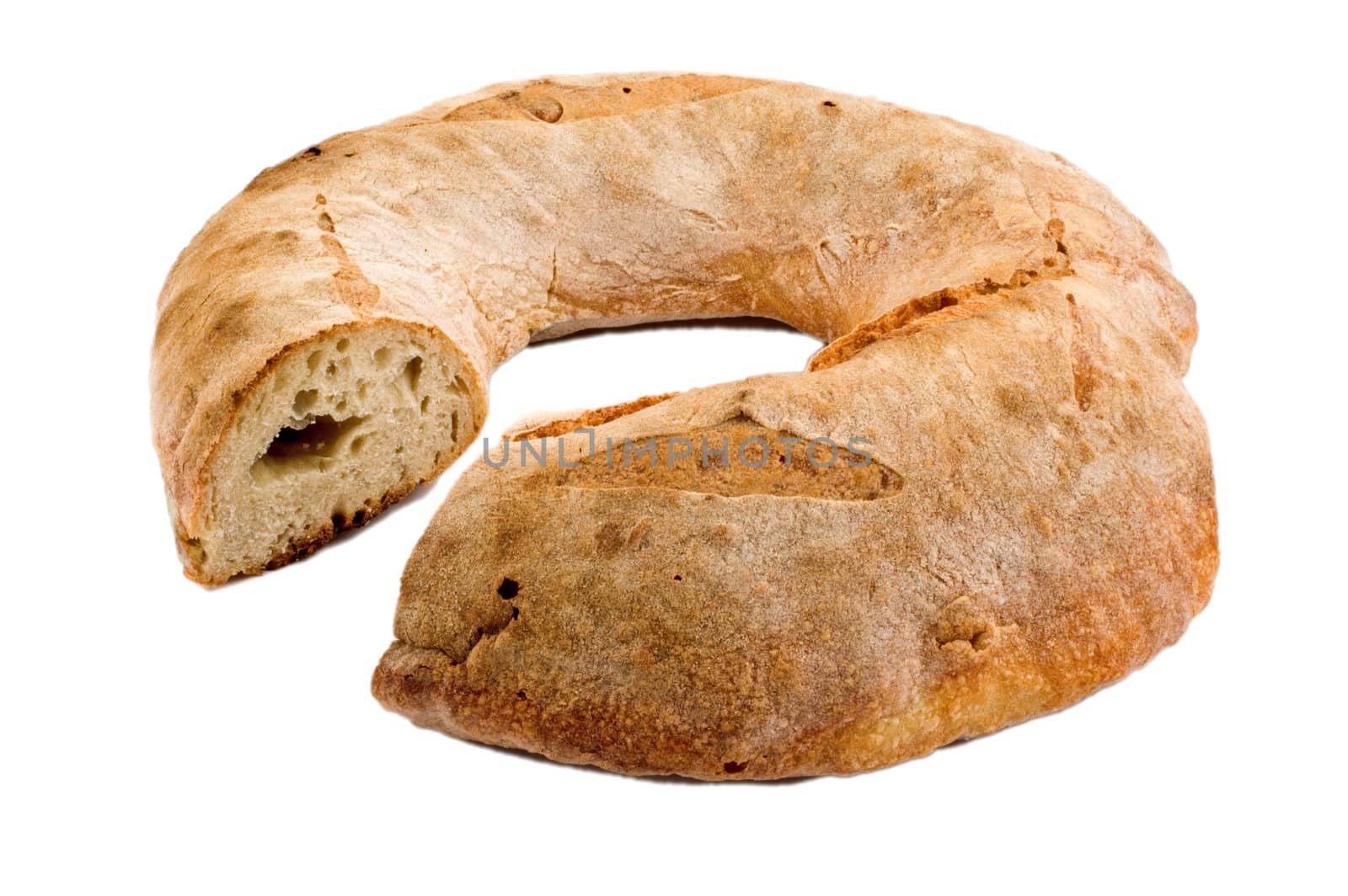 Ring-shaped Italian bread loaf isolated on white