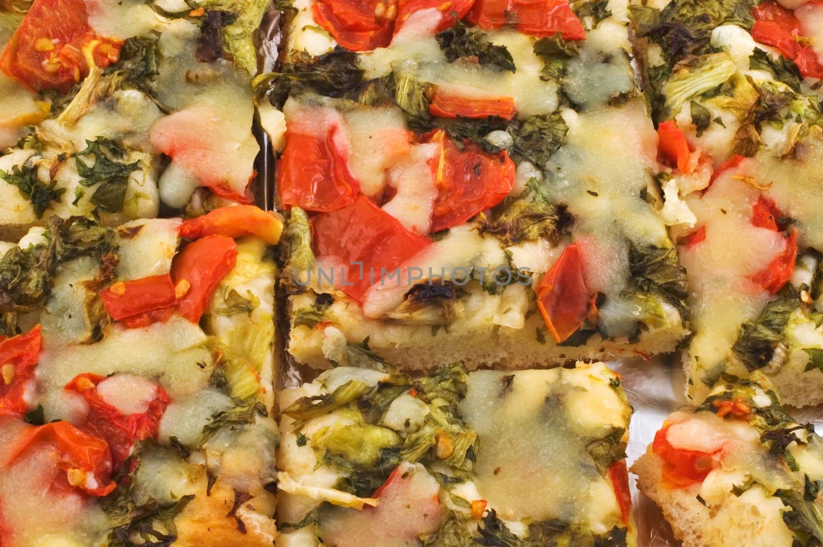 Close up of sliced pizza or sicilian 'focaccia'