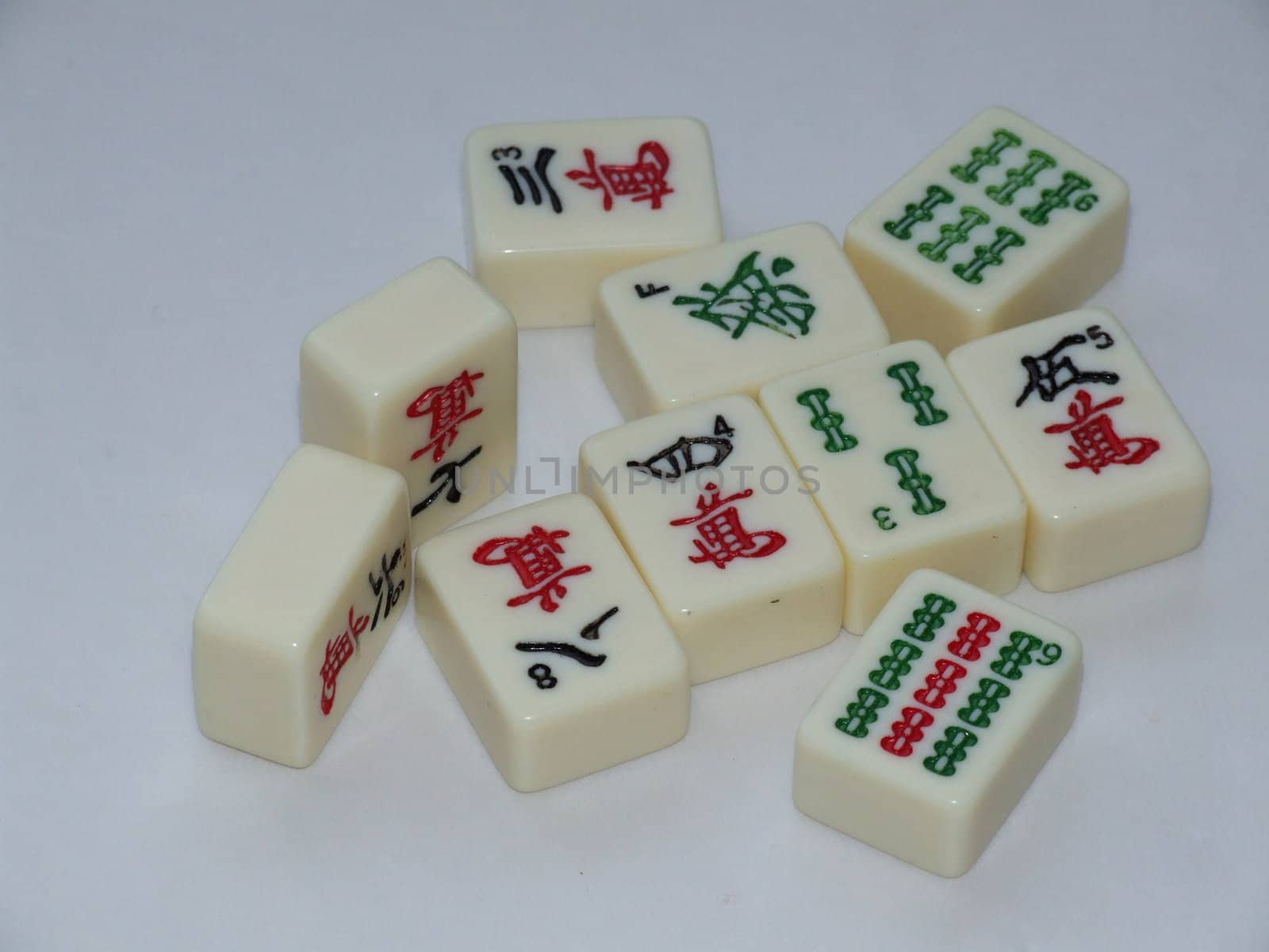 mar-jong tiles sitting on white background