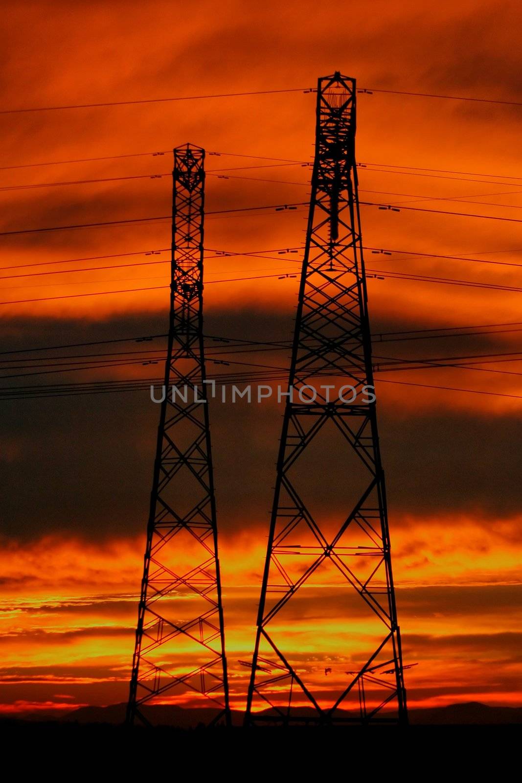 Electric Pylons and Sunset by fouroaks